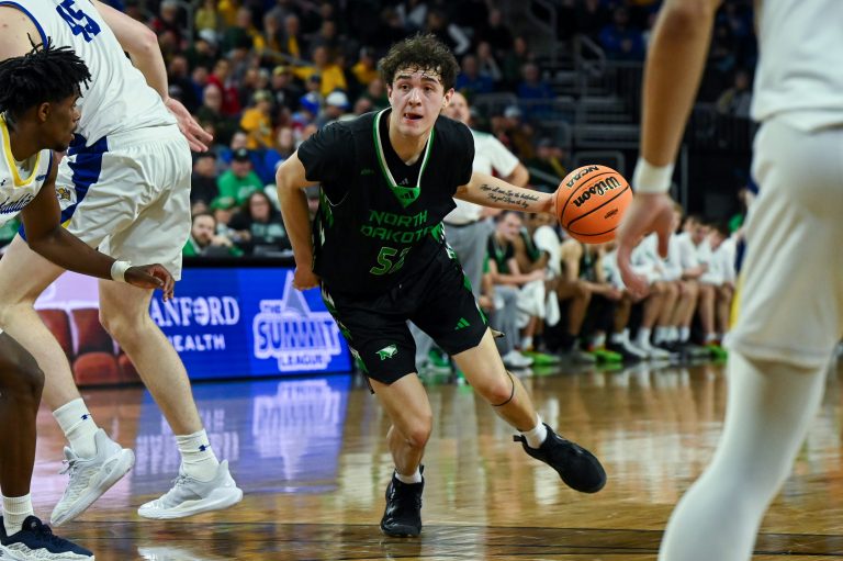 North Dakota Fighting Hawks guard Treysen Eaglestaff (52) moves the ball