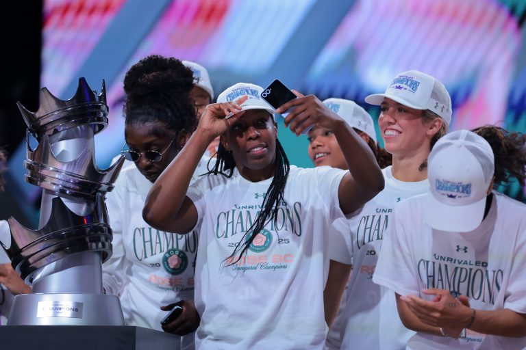 Rose BC guard Chelsea Gray (12) takes a selfie with the trophy after winning the Unrivaled Championship game against the Vinyl BC at Wayfair Arena.