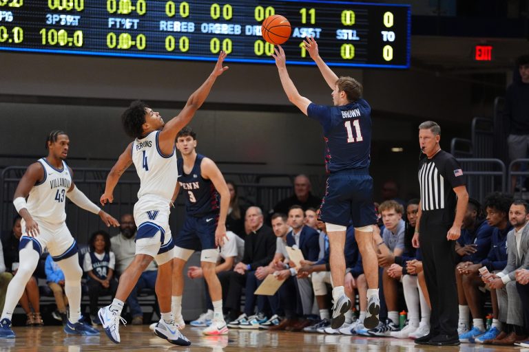 Penn Quakers guard Sam Brown (11) shoots against Villanova Wildcats guard Tyler Perkins (4) in the first half at William B. Finneran Pavilion