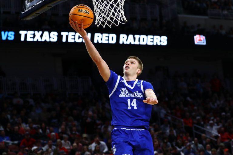 Drake Bulldogs guard Bennett Stirtz (14) shoots the ball against the Texas Tech Red Raiders during the second half at Intrust Bank Arena.