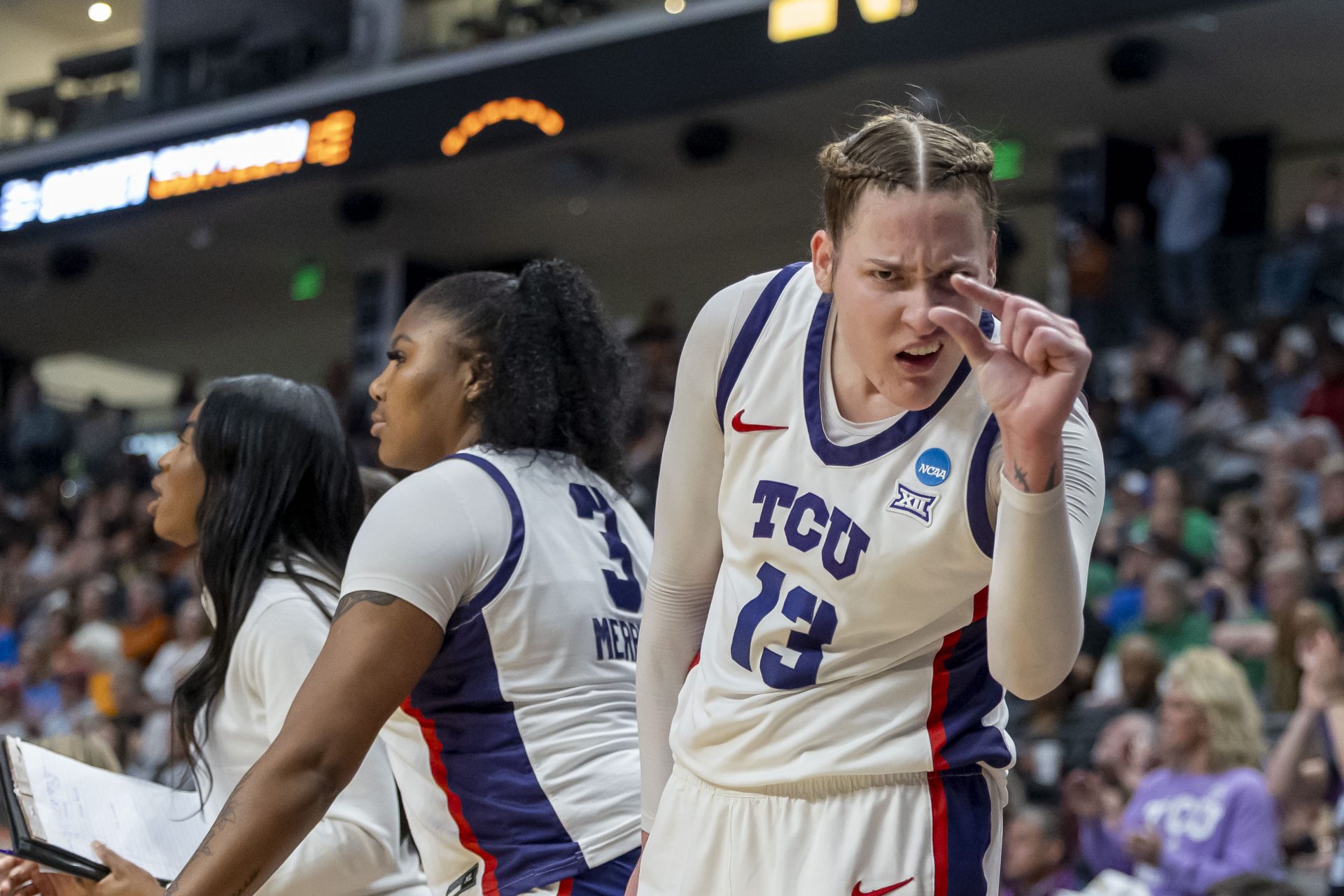 TCU Horned Frogs center Sedona Prince (13) gestures after her teammate scores during the second half of a Sweet 16 NCAA Tournament basketball game against the Notre Dame Fighting Irish at Legacy Arena.