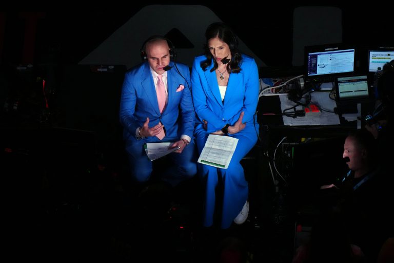 ESPN play-by-play announcer Ryan Ruocco (left) and commentator Rebecca Lobo during the 2024 NCAA Tournament Women's Final Four championship game at Rocket Mortgage FieldHouse.