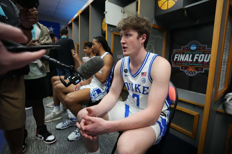 Duke Blue Devils guard Kon Knueppel (7) is interviewed during open locker room at Alamodome.