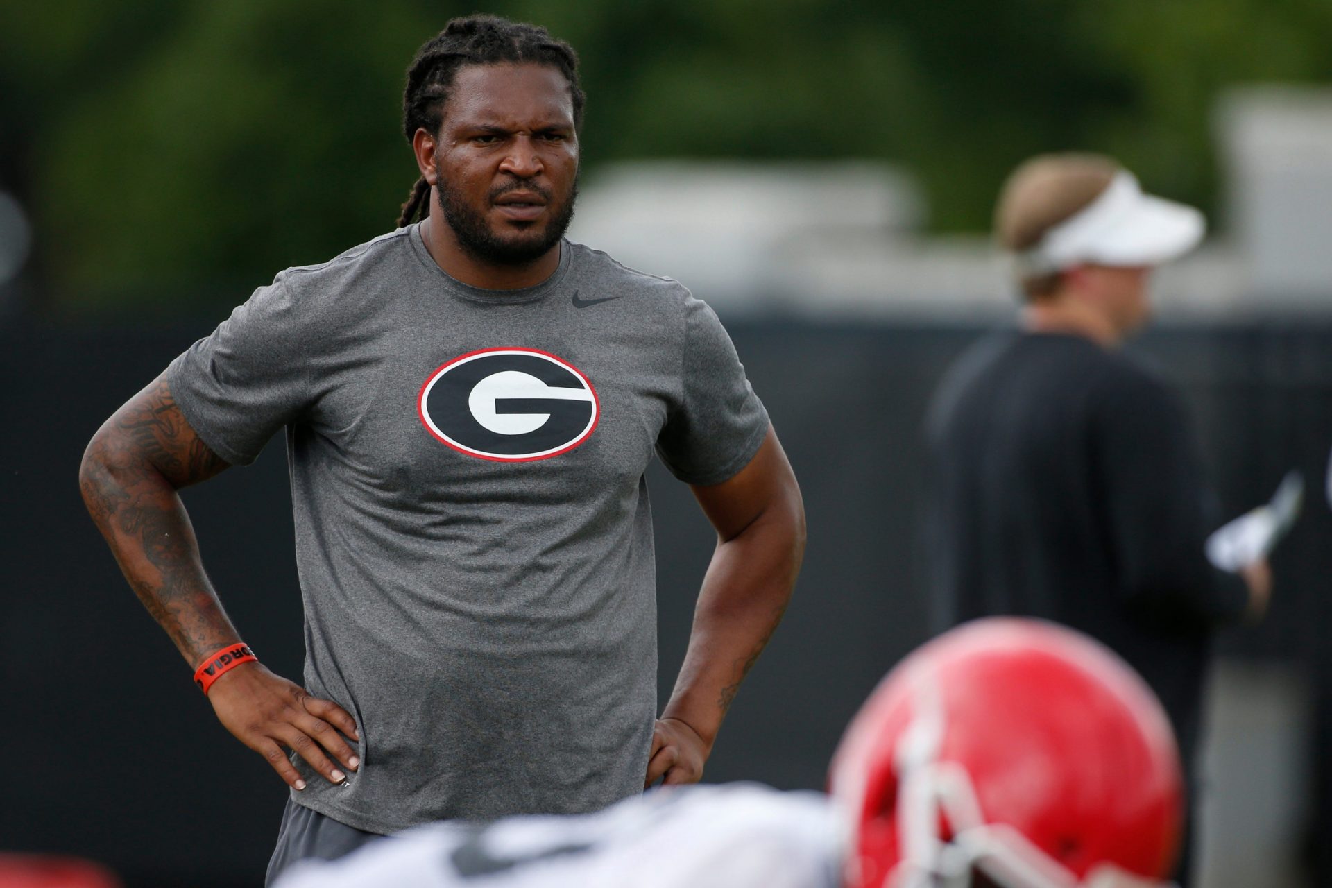 FILE - Jarvis Jones works with the Georgia defense during an NCAA college football practice in Athens, Ga., Friday, Aug. 2, 2019. Former Georgia and NFL linebacker Jarvis Jones, who now works on the football staff at his alma mater, was arrested for speeding and reckless driving ahead of the Bulldogs' season opener. Jones' arrest late Friday, Sept. 1, 2023, is the latest driving incident to tarnish the two-time reigning national champions. (Joshua L. Jones/Athens Banner-Herald via AP, File)