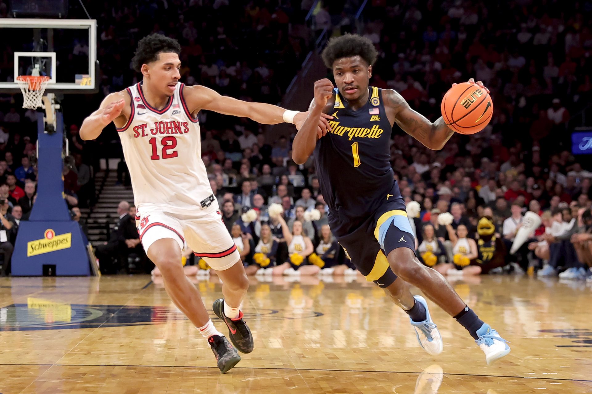 Marquette Golden Eagles guard Kam Jones (1) drives to the basket against St. John's Red Storm guard RJ Luis Jr. (12) during the first half at Madison Square Garden.