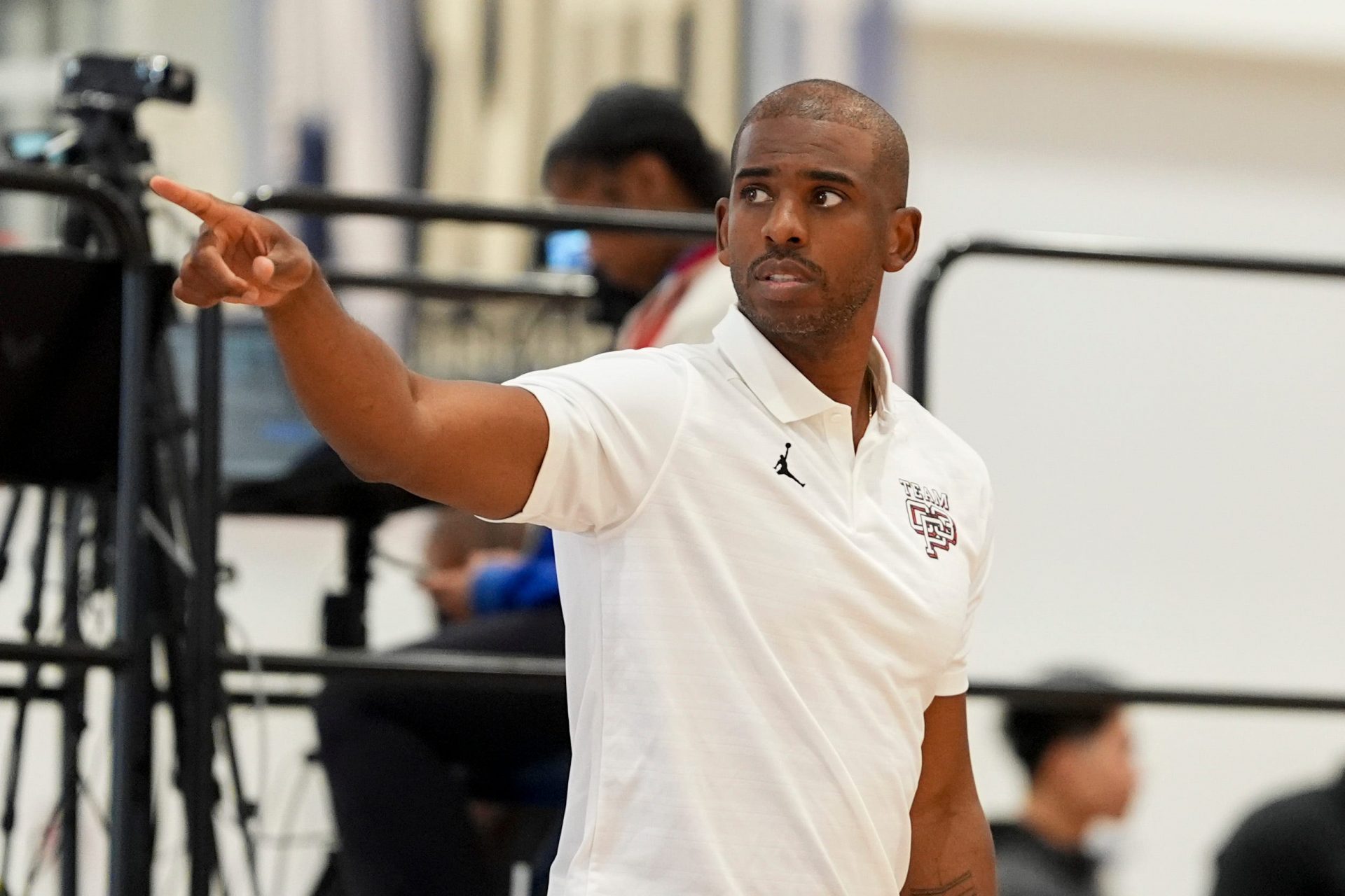 NBA player Chris Paul looks on as Team CP3 plays a game against Nightrydas at Nike EYBL at the Memphis Sports & Events Center on Saturday, May 17, 2025.