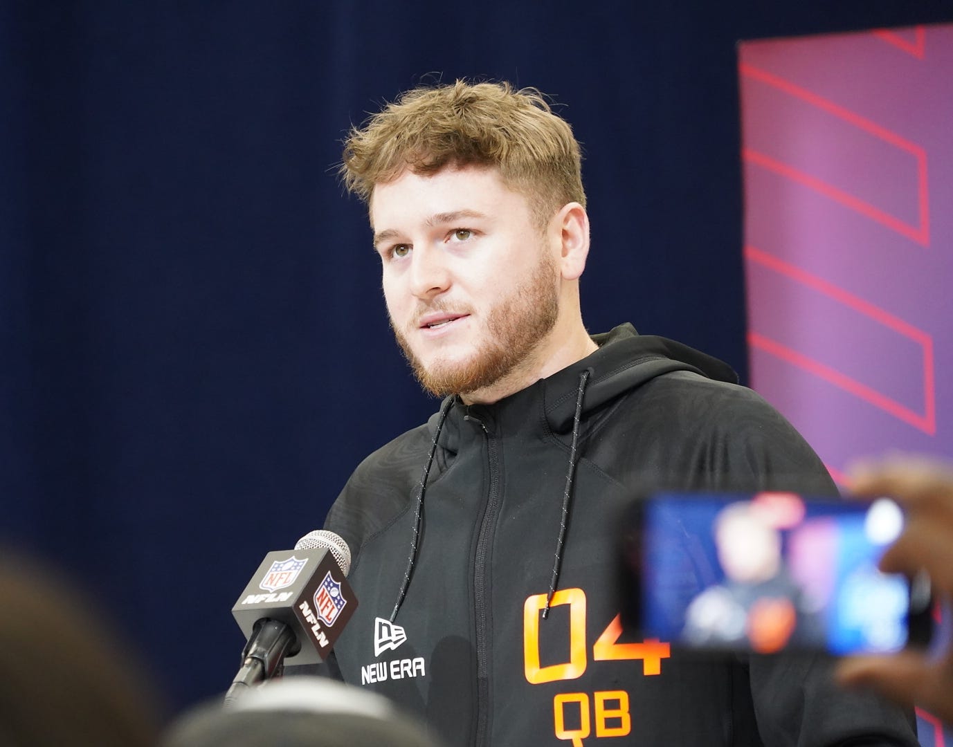 Texas quarterback Quinn Ewers speaks to the media at the 2025 NFL combine.
