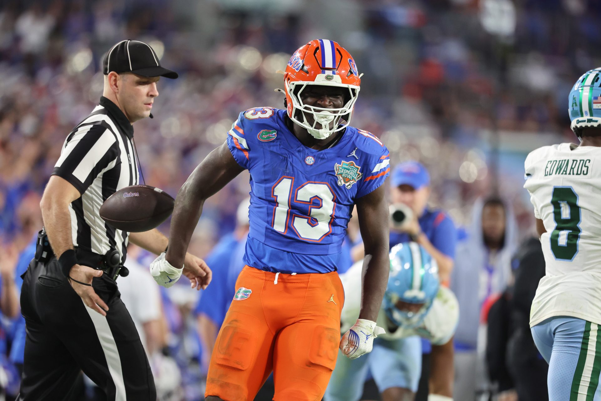Florida Gators running back Jadan Baugh (13) celebrates after he runs with the ball during the second half at Raymond James Stadium.