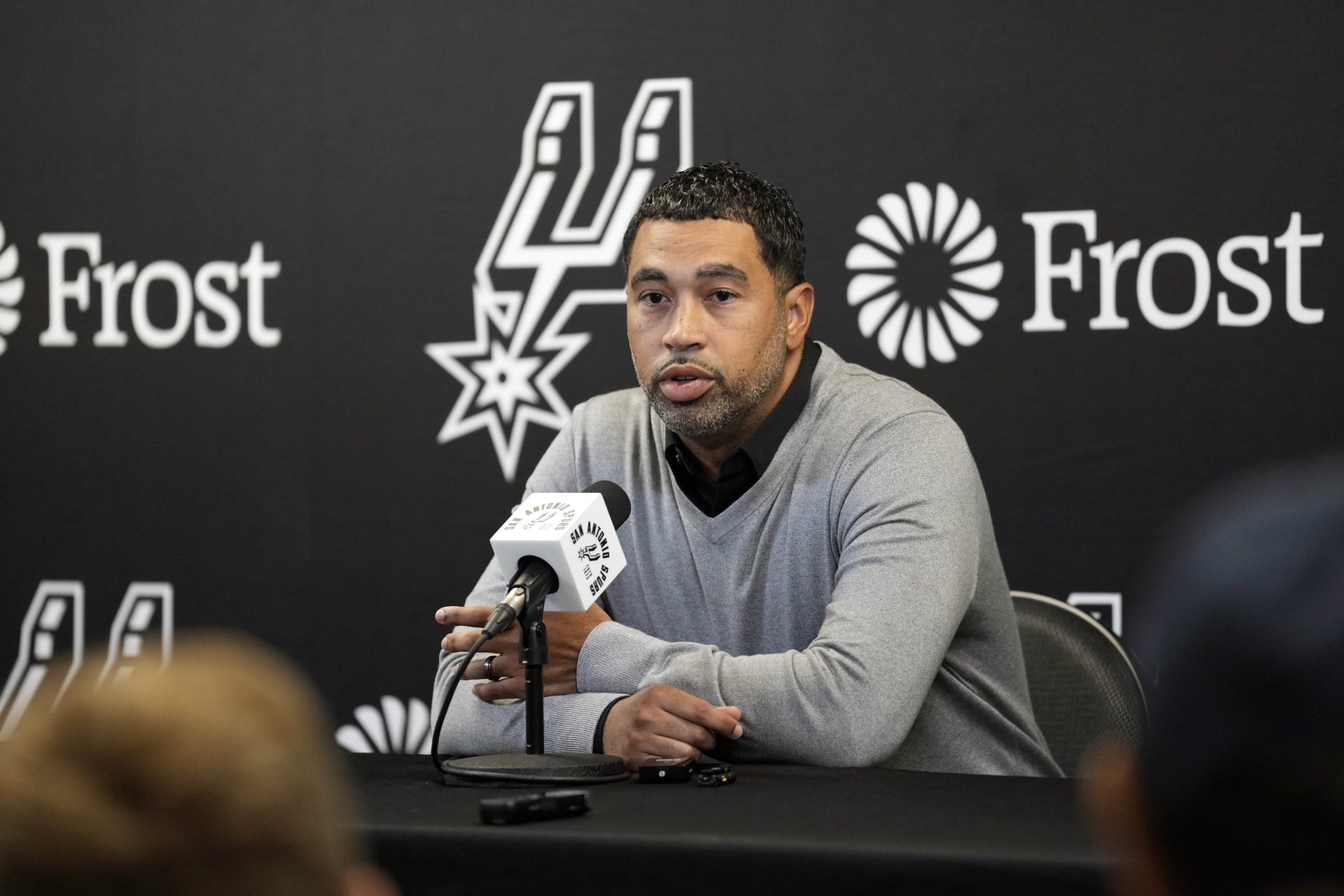 San Antonio Spurs general manager Brian Wright speaks with the media about the health and absence of head coach Gregg Popovich before a game against the Washington Wizards at Frost Bank Center.
