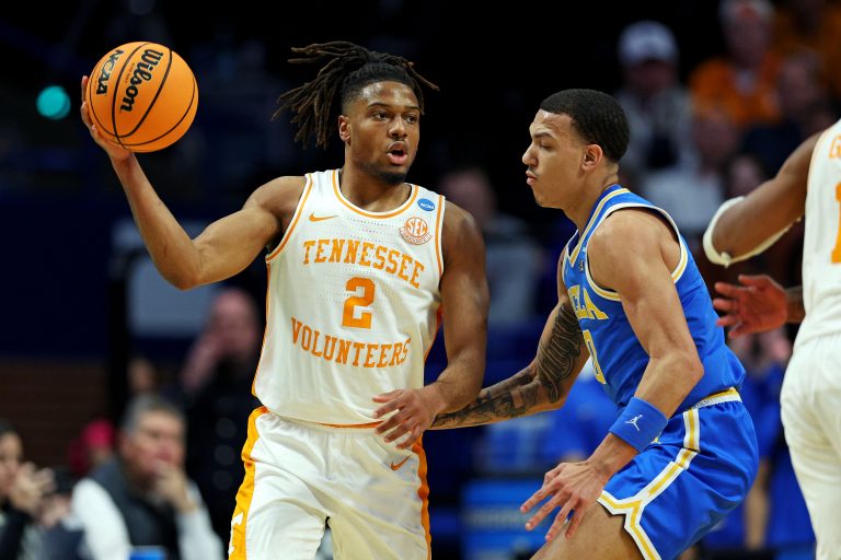 Tennessee Volunteers guard Chaz Lanier (2) handles the ball against UCLA Bruins guard Kobe Johnson (0) during the first half in the second round of the NCAA Tournament at Rupp Arena.