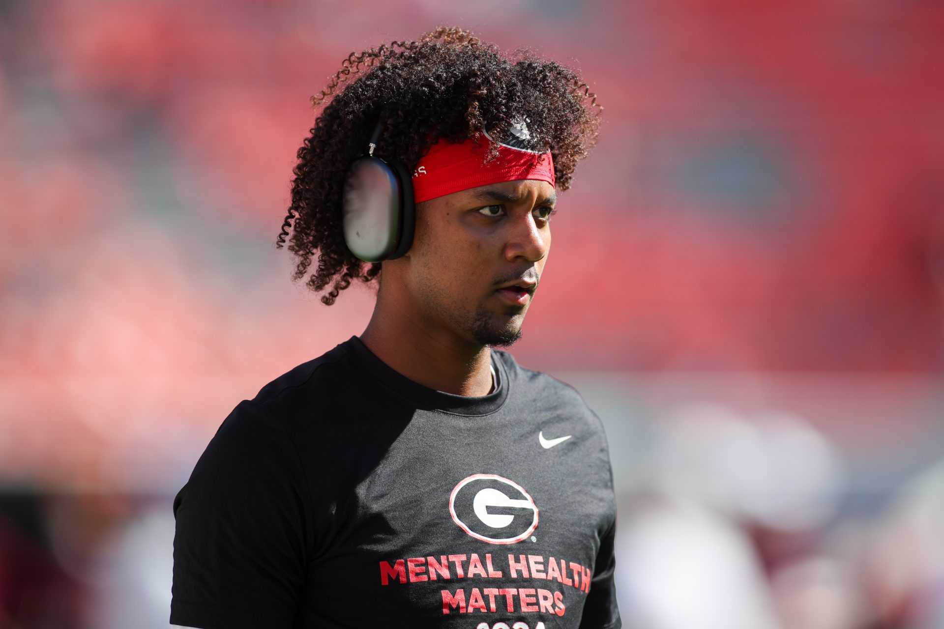 Georgia Bulldogs quarterback Jaden Rashada (10) warms up before a game against the Mississippi State Bulldogs at Sanford Stadium.