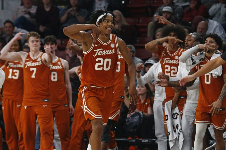 Texas Longhorns guard Tre Johnson (20) reacts after basket during the second half against the Mississippi State Bulldogs at Humphrey Coliseum.