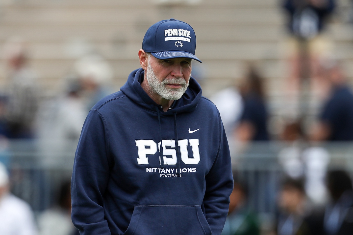 Penn State Nittany Lions defensive coordinator Jim Knowles walks on the field prior to the Blue White spring game at Beaver Stadium.