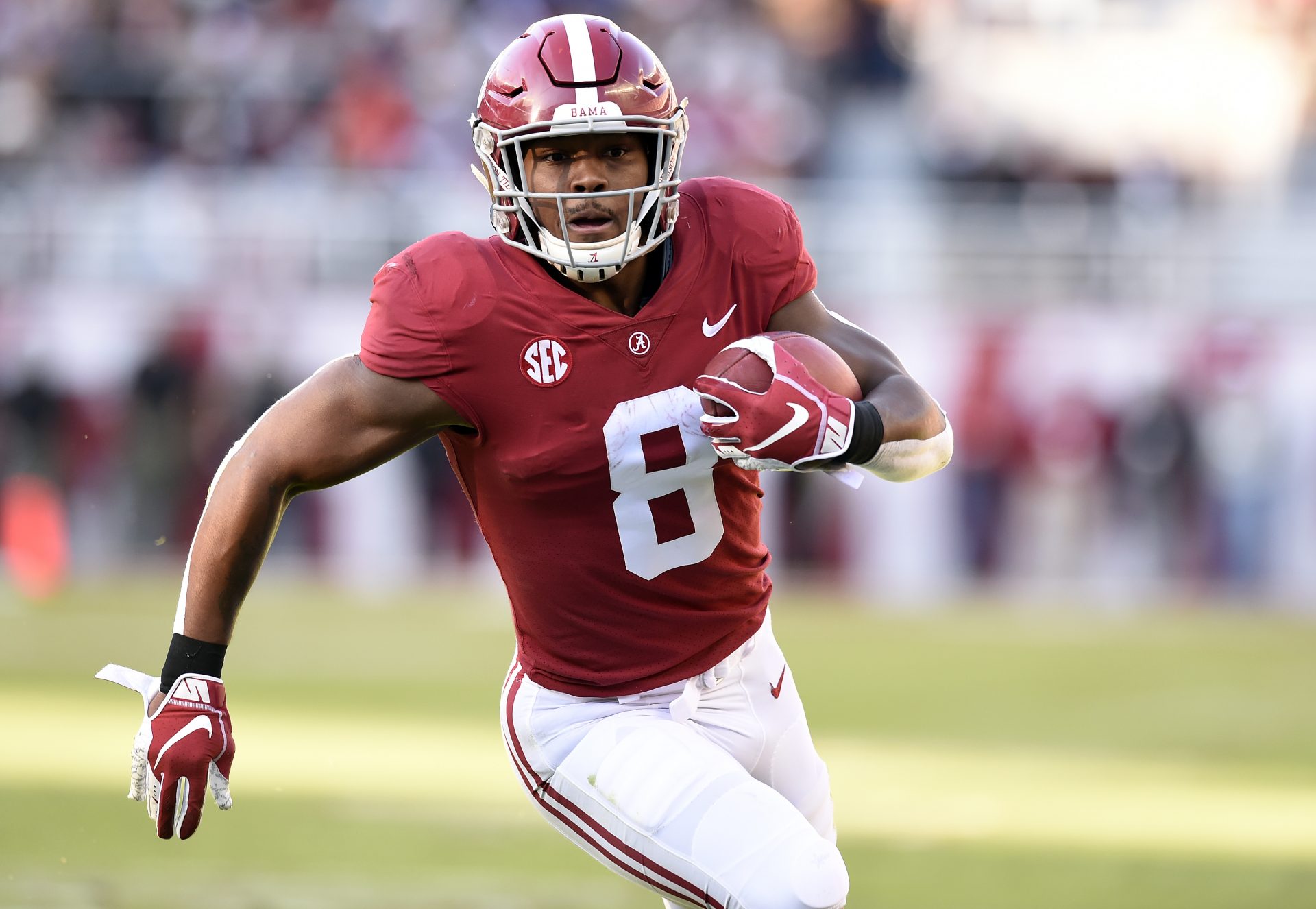 Alabama Crimson Tide running back Josh Jacobs (8) carries the ball against the Mississippi State Bulldogs during the first quarter at Bryant-Denny Stadium.