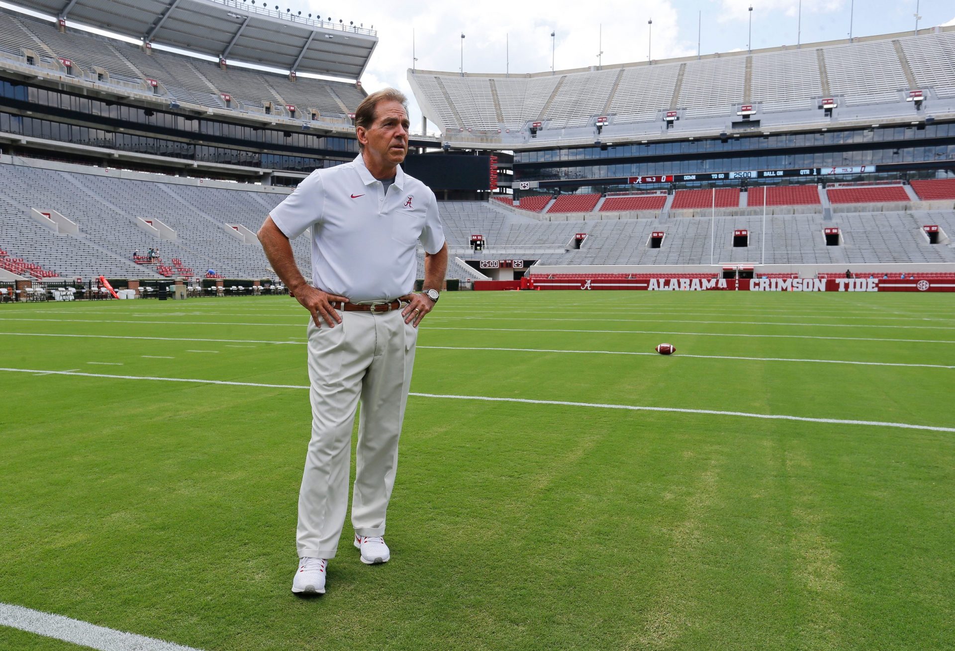 Coach Nick Saban stands on the turf inside Bryant-Denny Stadium during media day Saturday, August 3, 2019 in Bryant-Denny Stadium. [Staff Photo/Gary Cosby Jr.]