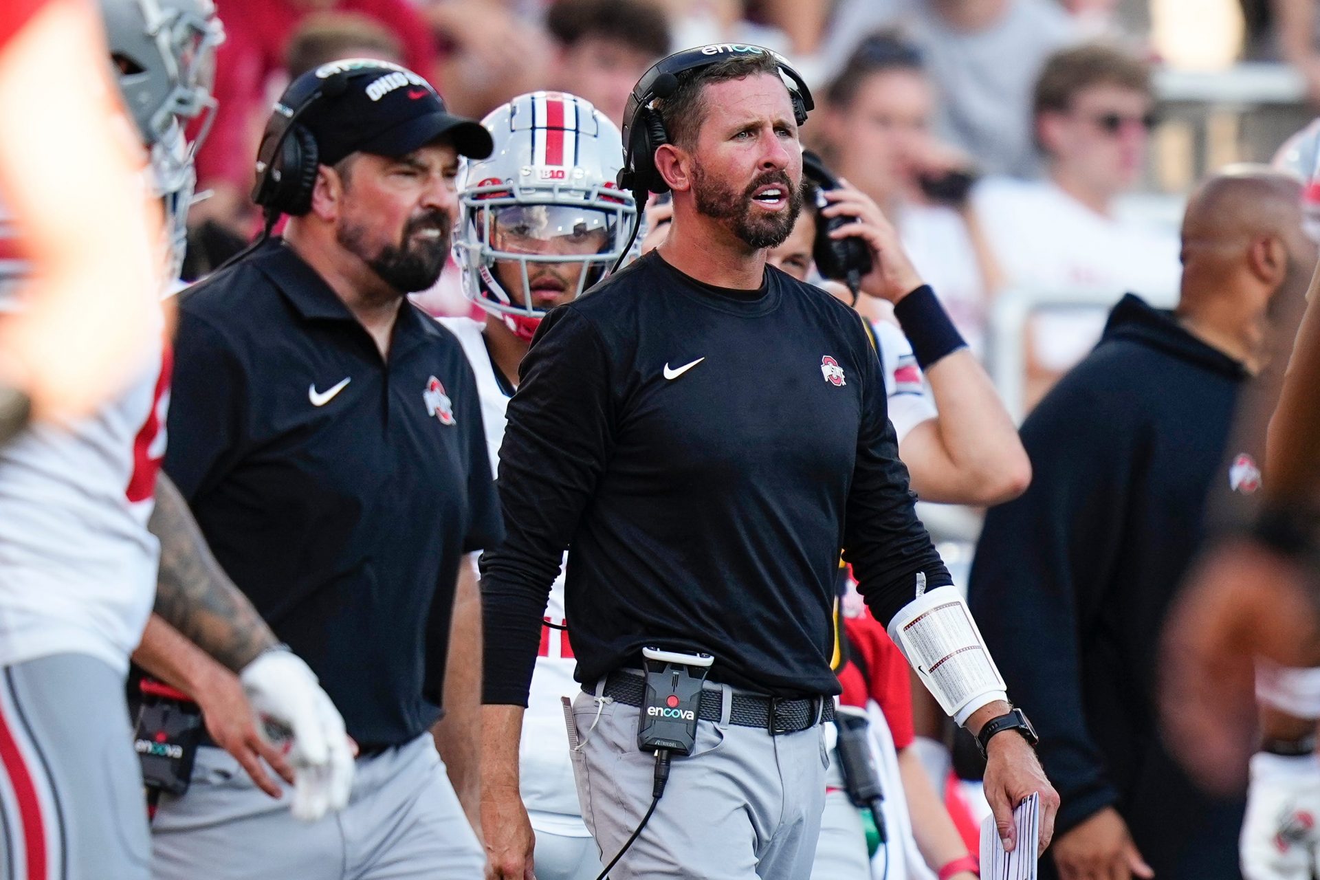 Ohio State Buckeyes head coach Ryan Day and offensive coordinator Brian Hartline yell from the sideline during the NCAA football game at Indiana University Memorial Stadium. Ohio State won 23-3.