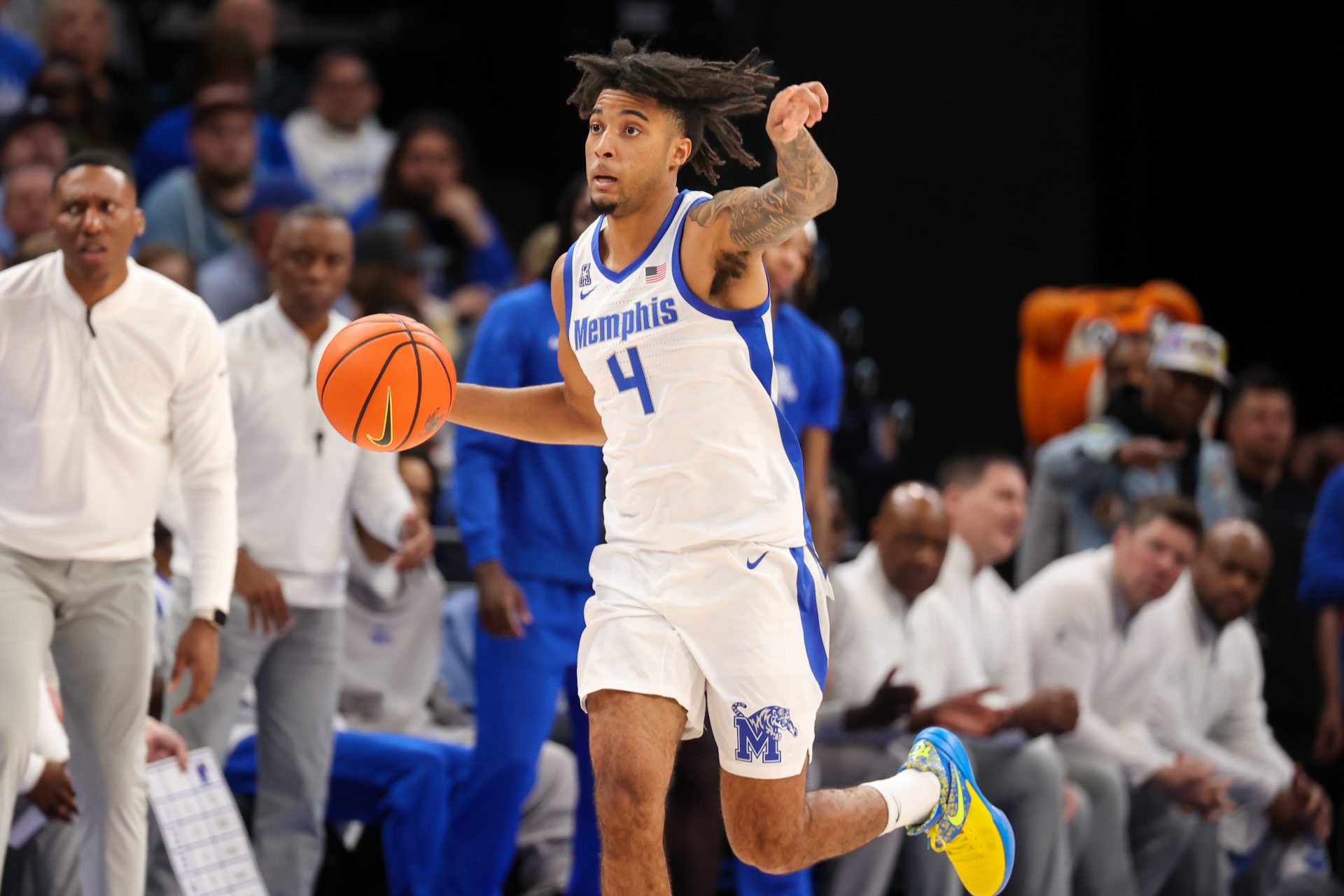 Memphis Tigers guard PJ Haggerty (4) handles the ball against the South Florida Bulls during the first half at FedExForum.