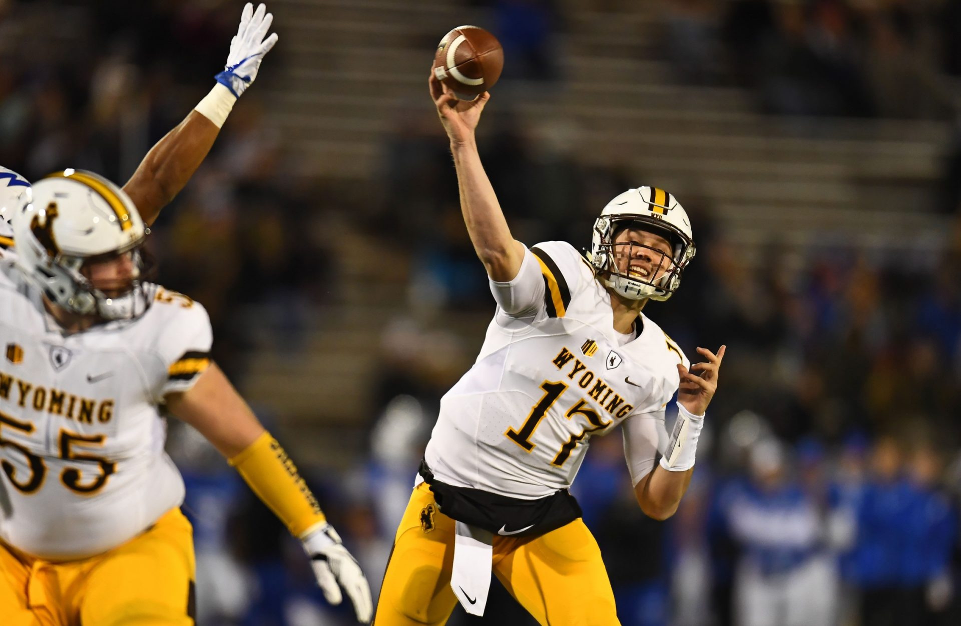 Wyoming Cowboys quarterback Josh Allen (17) attempts a pass in the first quarter against the Air Force Falcons at Falcon Stadium.