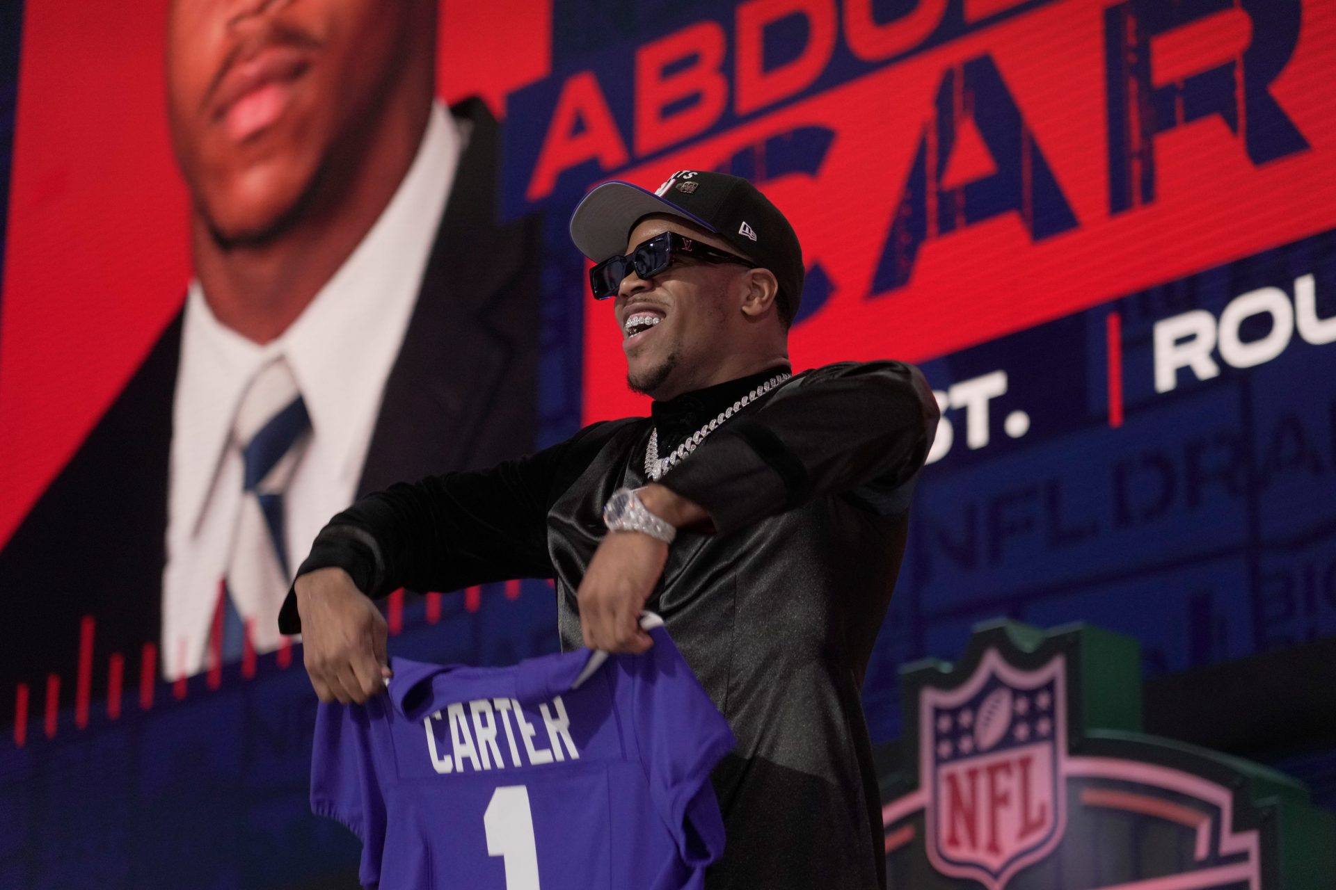 Penn State defensive end Abdul Carter poses after being selected 3rd overall by the New York Giants during the first round of the 2025 NFL Draft at Lambeau Field on April 24, 2025 in Green Bay, Wisconsin.