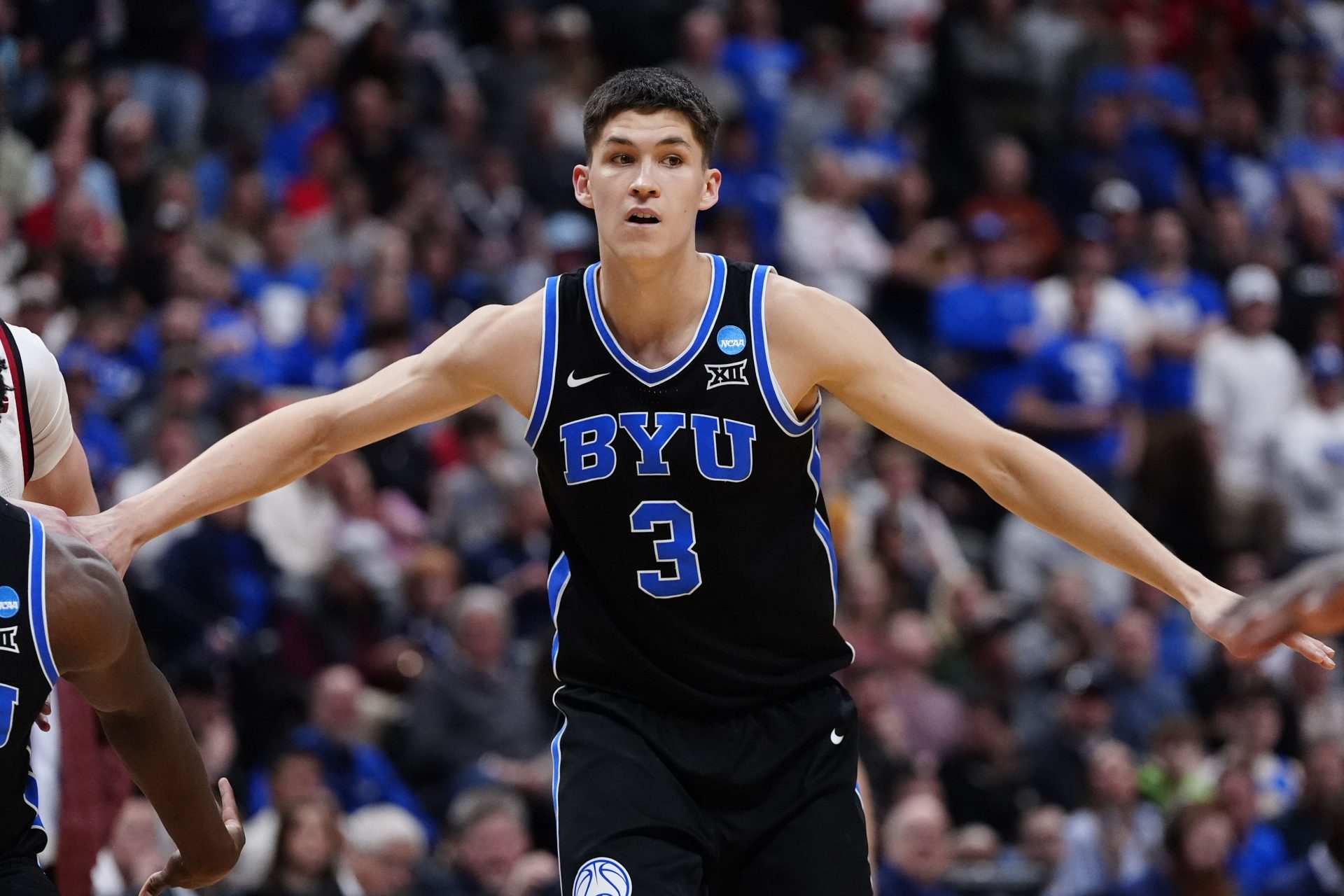 Brigham Young Cougars guard Egor Demin (3) reacts against the Wisconsin Badgers during the second half in the second round of the NCAA Tournament  at Ball Arena.