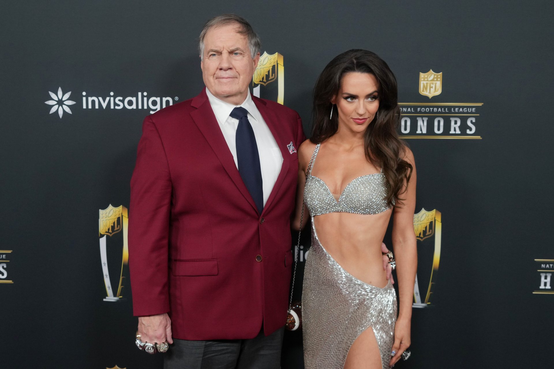 Bill Belichick and Jordon Hudson on the red carpet before Super Bowl LIX NFL Honors at Saenger Theatre.