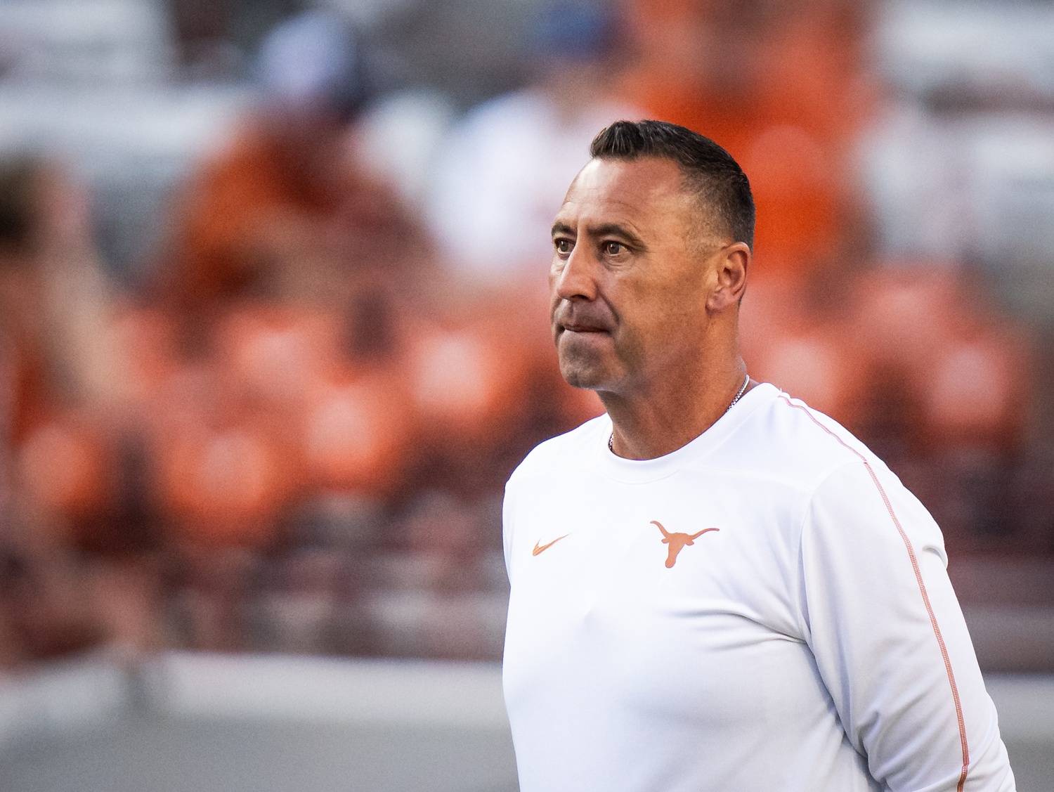 Texas Head Coach Steve Sarkisian watches his team warm up ahead of the Texas Longhorns' game against the ULM Warhawks at Darrell K Royal Texas Memorial Stadium.