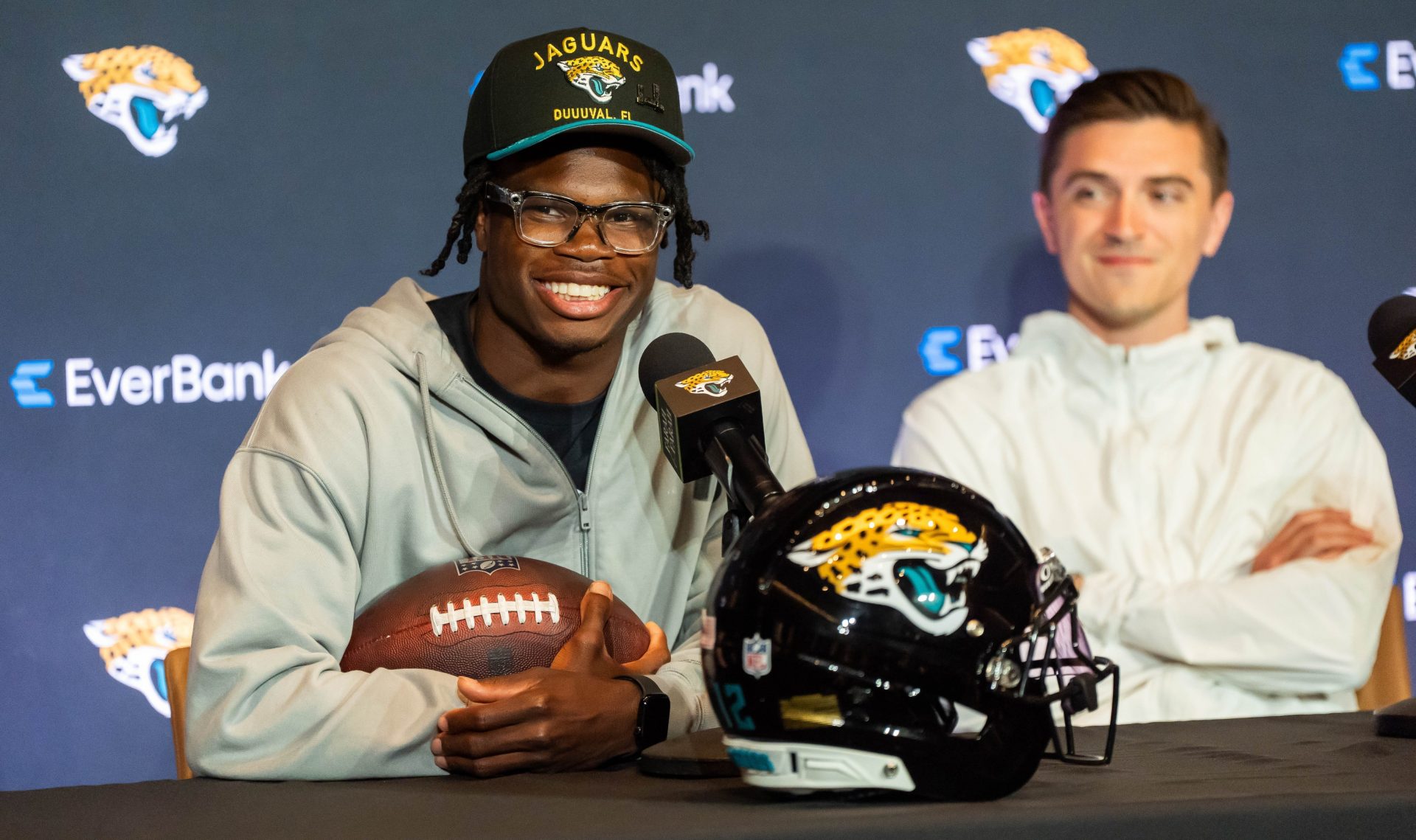 The Jacksonville Jaguars’ first-round pick, Colorado Buffaloes wide receiver and defensive back Travis Hunter, left, answers questions during a press conference Friday, March 25, 2025 at Miller Electric Center in Jacksonville, Fla. with General Manager James Gladstone, right. [Doug Engle/Florida Times-Union]
