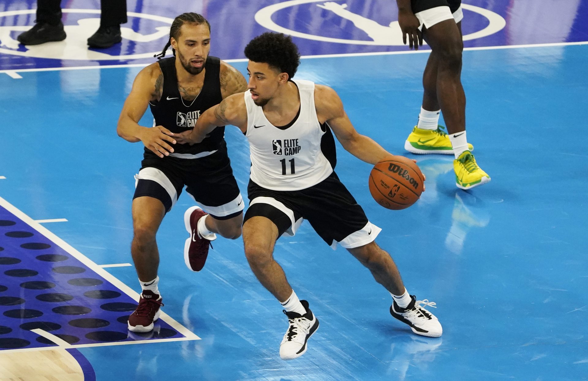 Scotty Pippen Jr. (11) is defended by Jose Alvarado (1) during the NBA G League Elite Camp at Wintrust Arena.