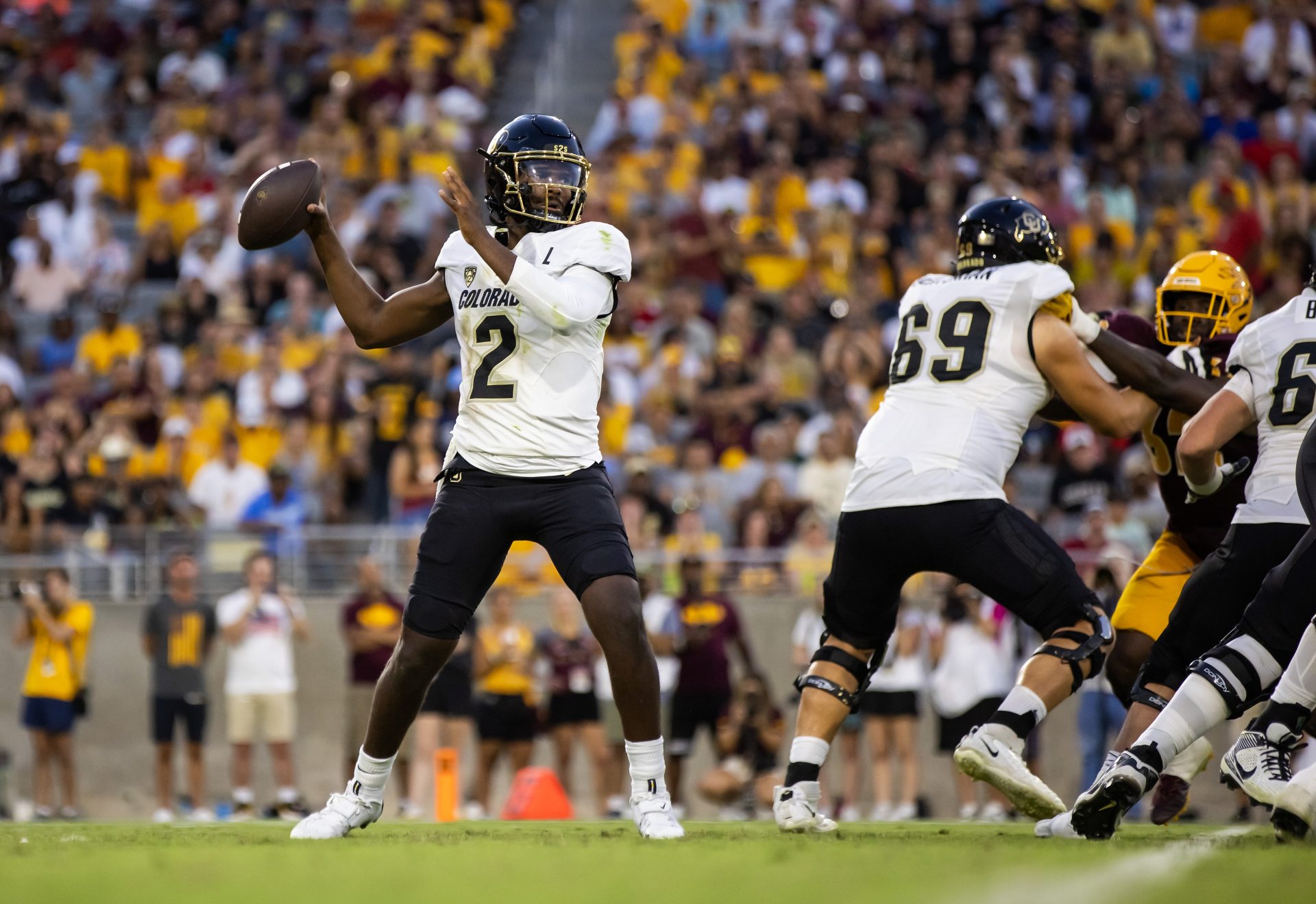 Colorado Buffaloes quarterback Shedeur Sanders (2) against the Arizona State Sun Devils in the second half at Mountain America Stadium, Home of the ASU Sun Devils.