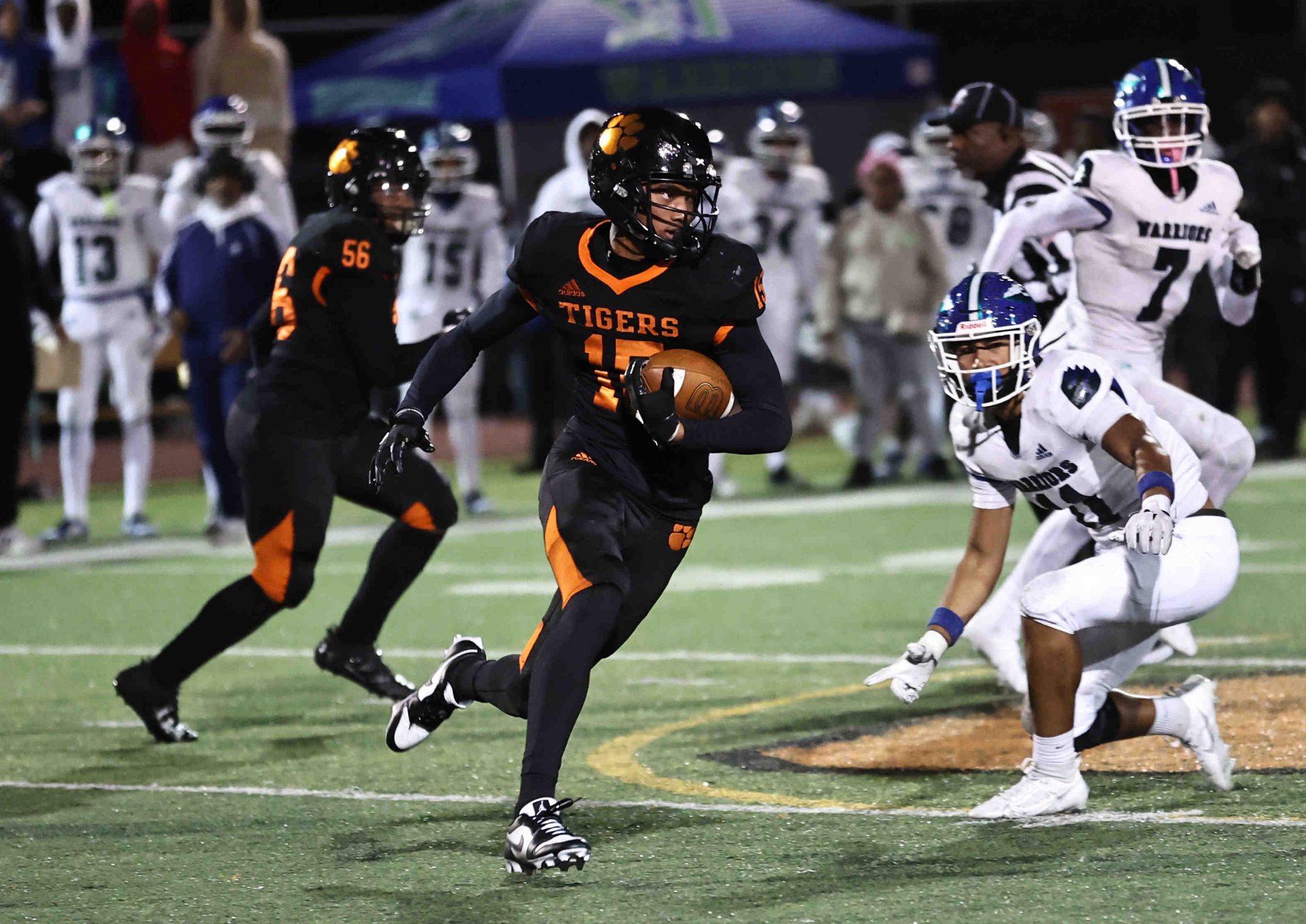 Withrow wide receiver Chris Henry Jr. runs the ball during the Tigers' playoff win over Winton Woods Friday, Nov. 3, 2023.