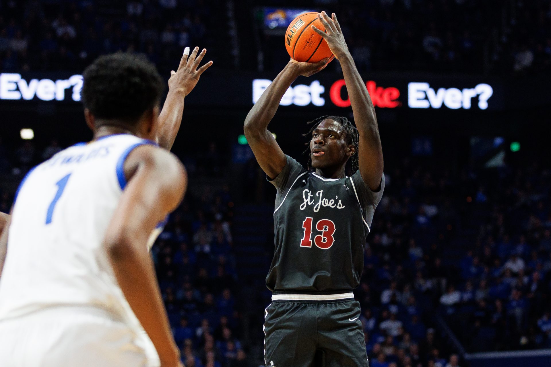 Saint Joseph's Hawks forward Rasheer Fleming (13) shoots the ball during the first half against the Kentucky Wildcats at Rupp Arena at Central Bank Center.