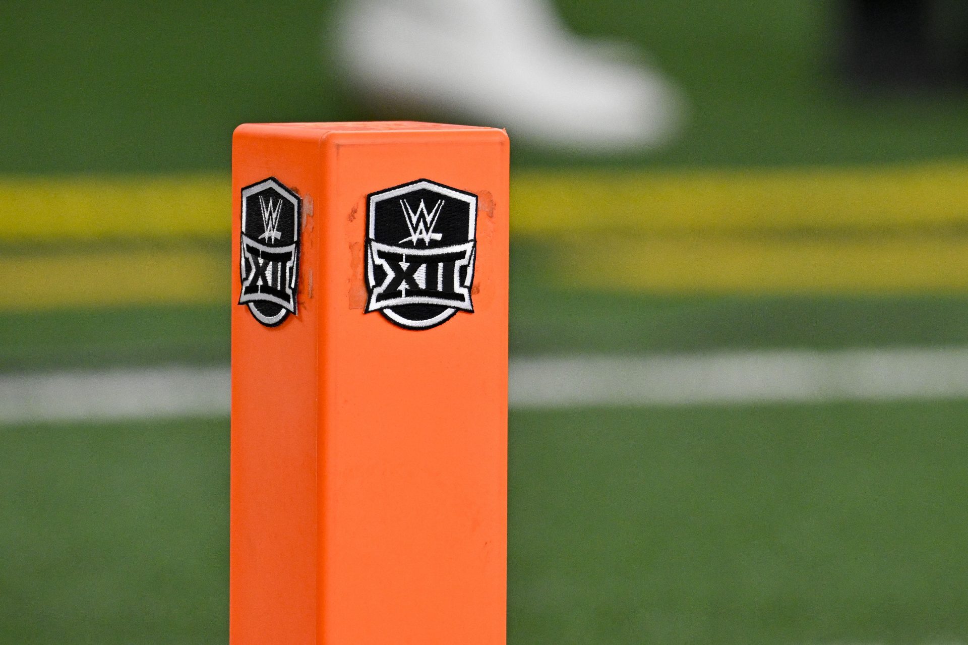 A view of the WWE wrestling logo on a touchdown pylon before the game between the Texas Longhorns and the Oklahoma State Cowboys at AT&T Stadium.