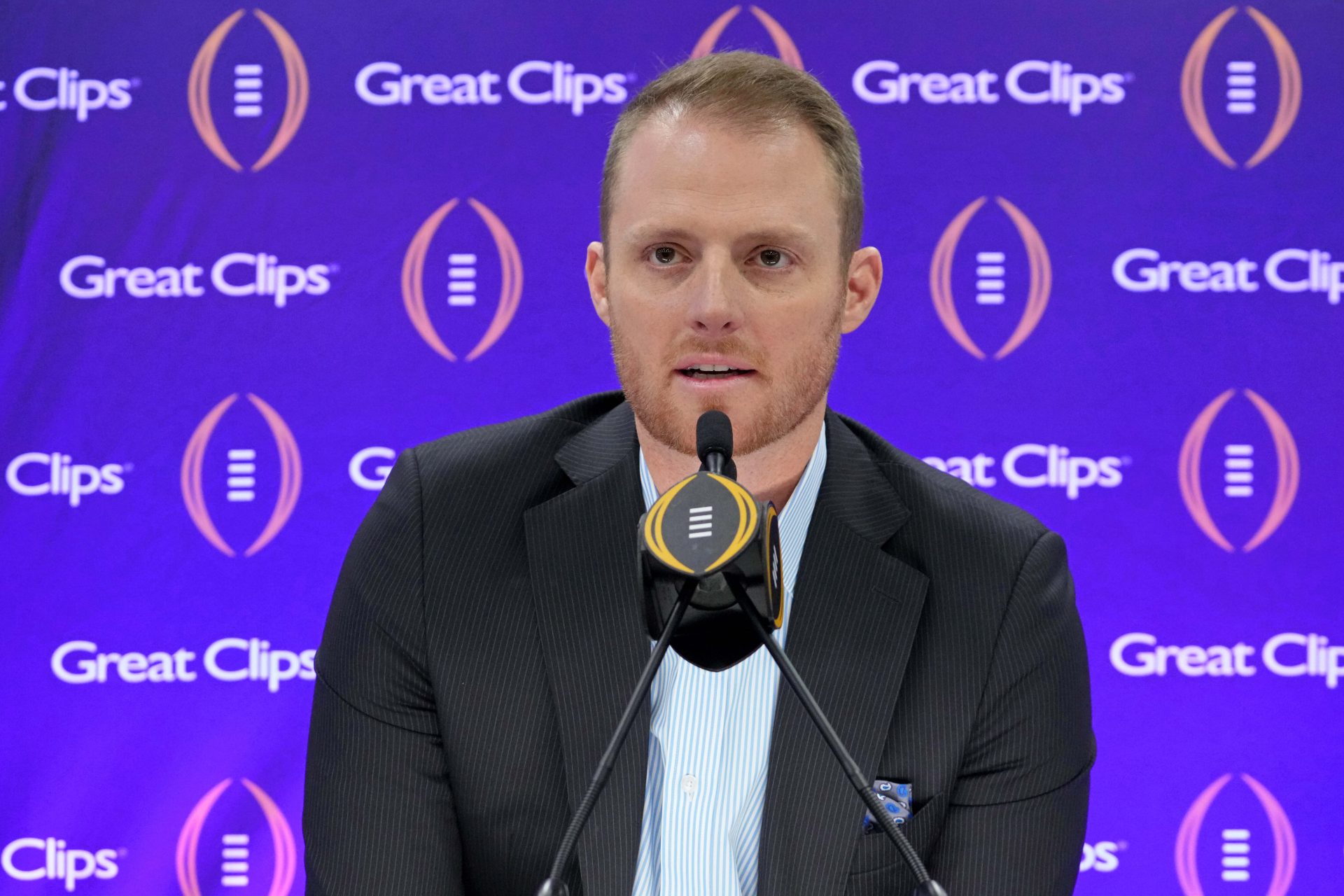 ESPN analyst Greg McElroy talks to the media during media day before the College Football Playoff national championship game against the Michigan Wolverines at George R Brown Convention Center.