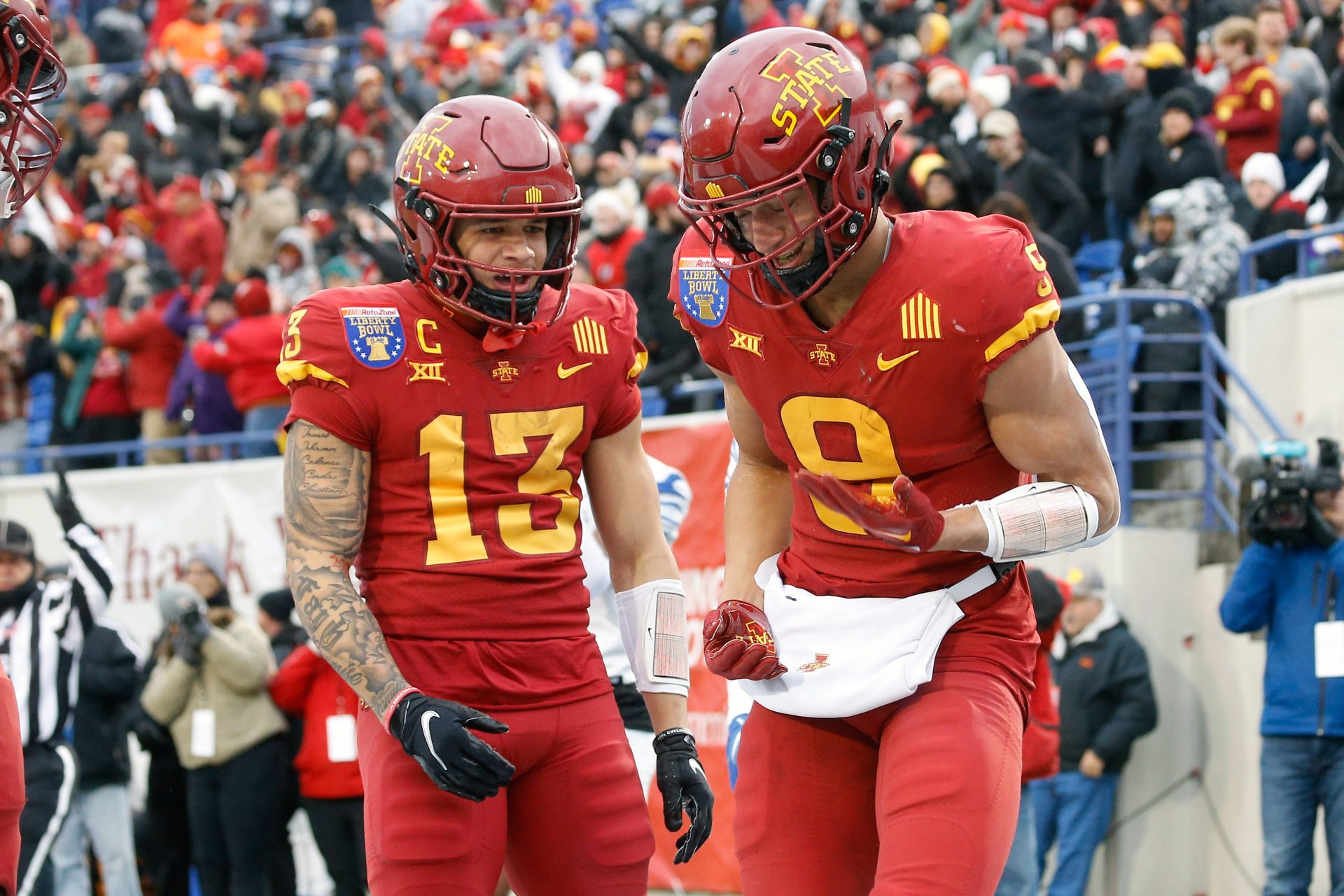 Iowa State Cyclones wide receiver Jaylin Noel (13) and wide receiver Jayden Higgins (9) react after a touchdown during the first half against the Memphis Tigers at Simmons Bank Liberty Stadium.