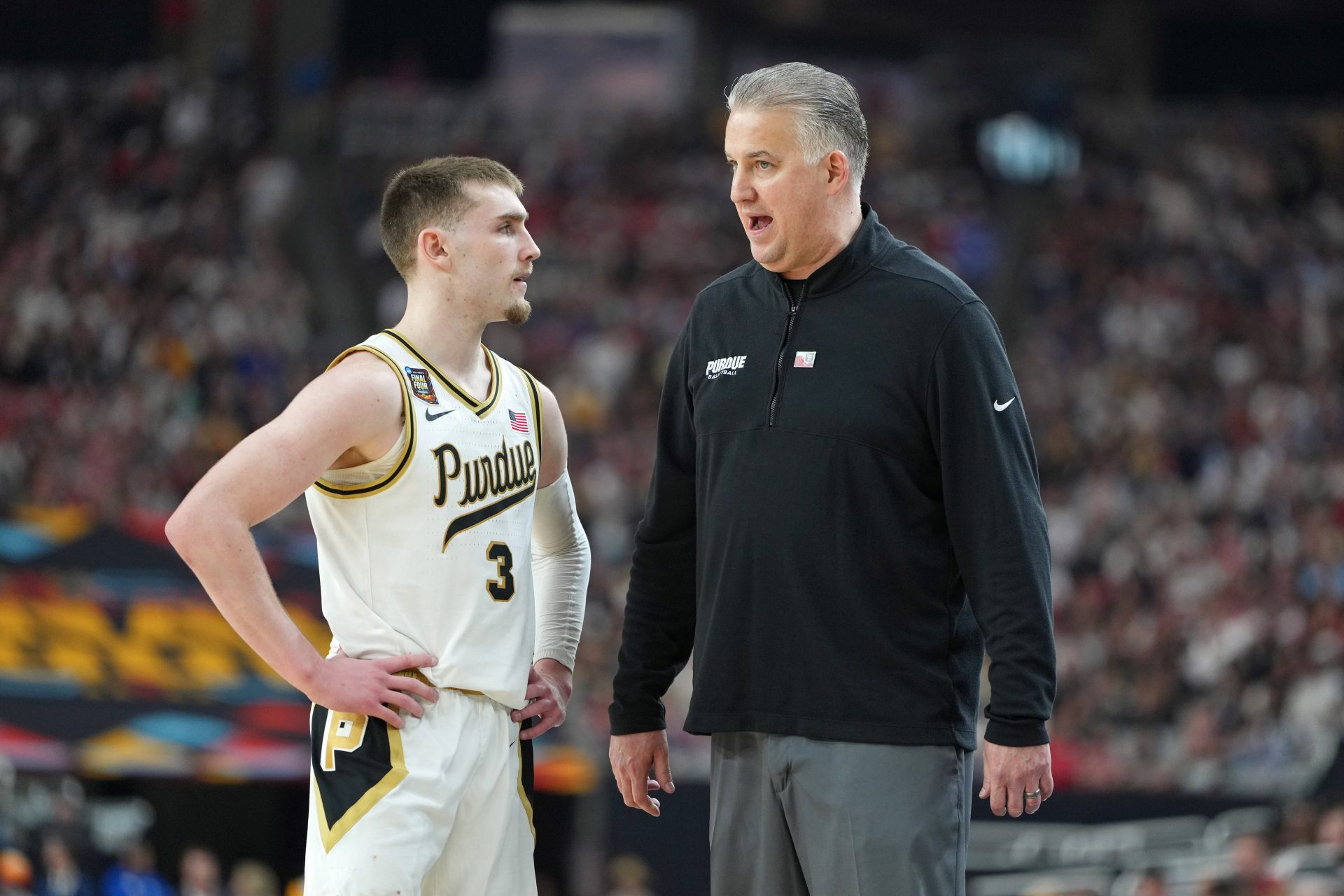 Purdue Boilermakers guard Braden Smith (3) talks with Purdue Boilermakers head coach Matt Painter during the second half in the semifinals of the men's Final Four of the 2024 NCAA Tournament at State Farm Stadium.