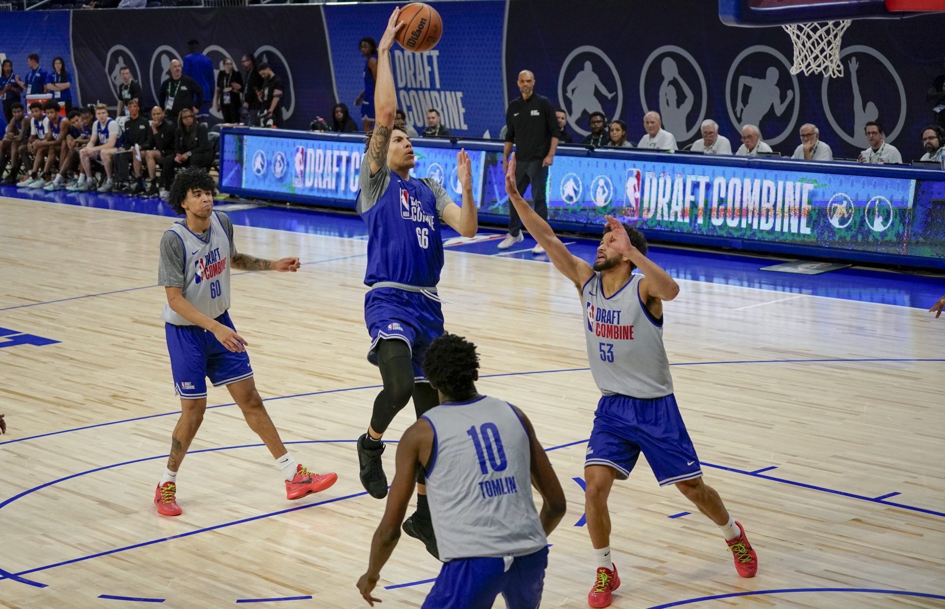 Coleman Hawkins (66) and Nae’Qwan Tomlin (10) participate during the 2024 NBA Draft Combine at Wintrust Arena.