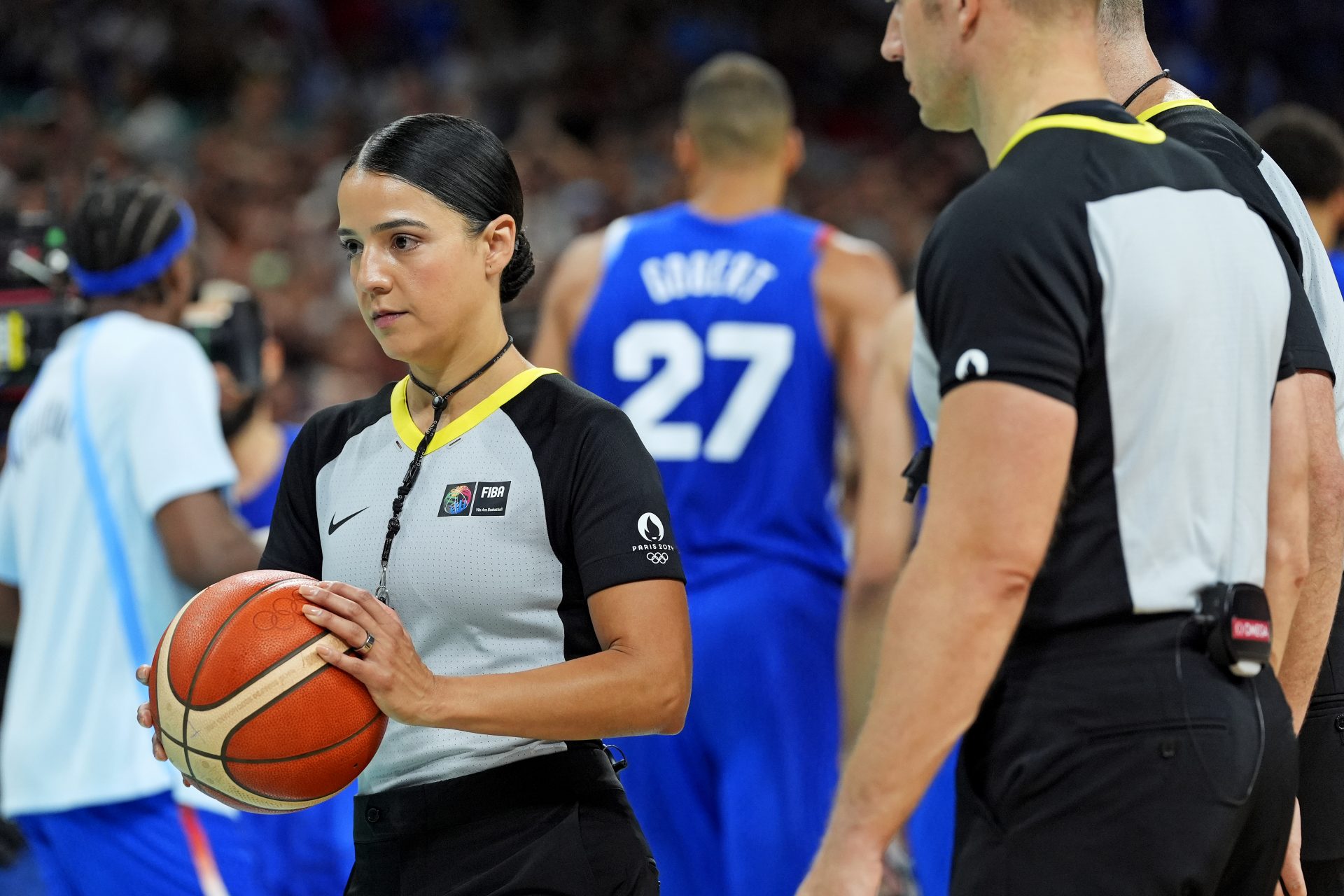 FIBA referee Blanca Burns walks off the court after France defeated Japan in men’s basketball group B play during the Paris 2024 Olympic Summer Games at Stade Pierre-Mauroy.