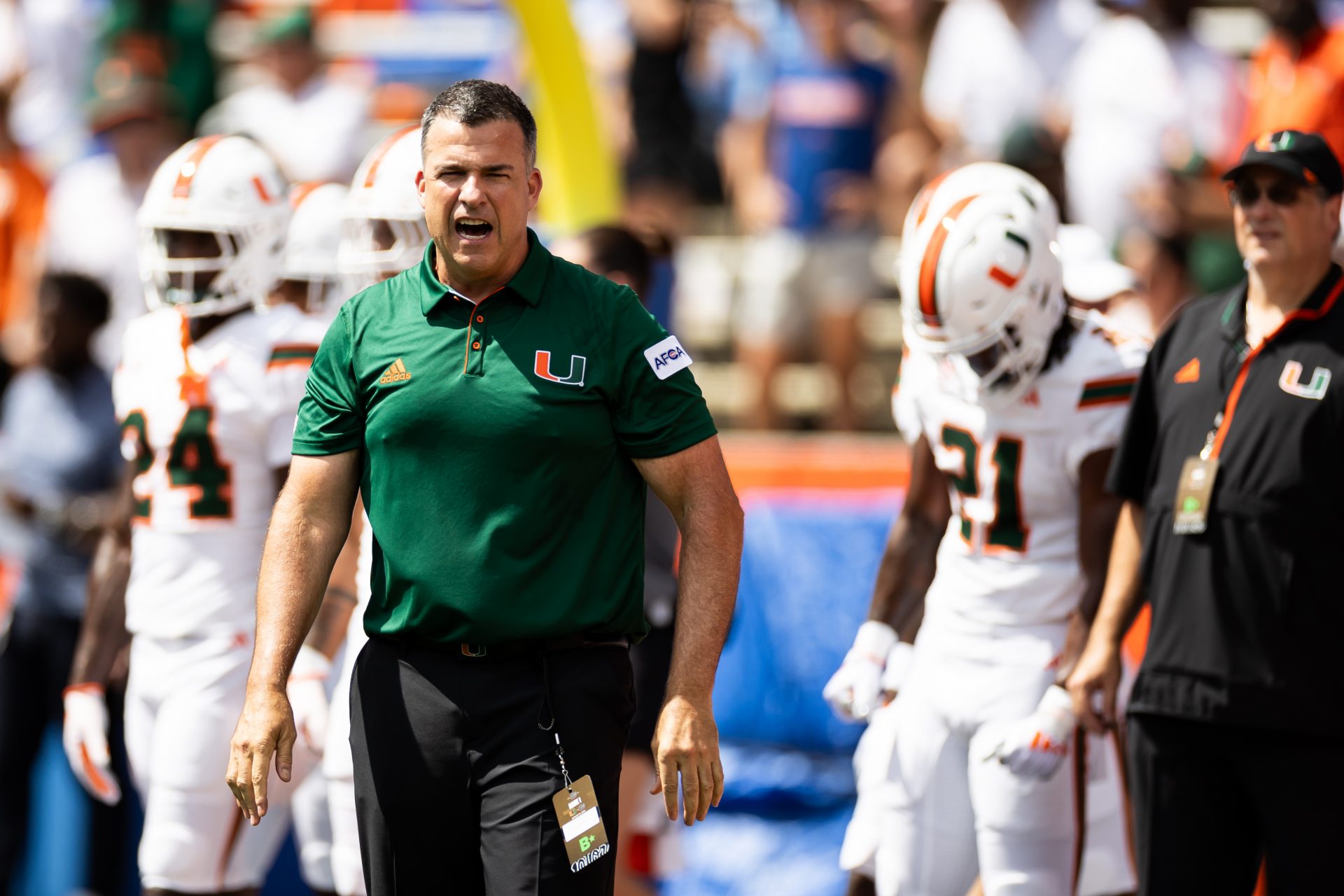 Miami Hurricanes head coach Mario Cristobal reacts before a game against the Florida Gators at Ben Hill Griffin Stadium.