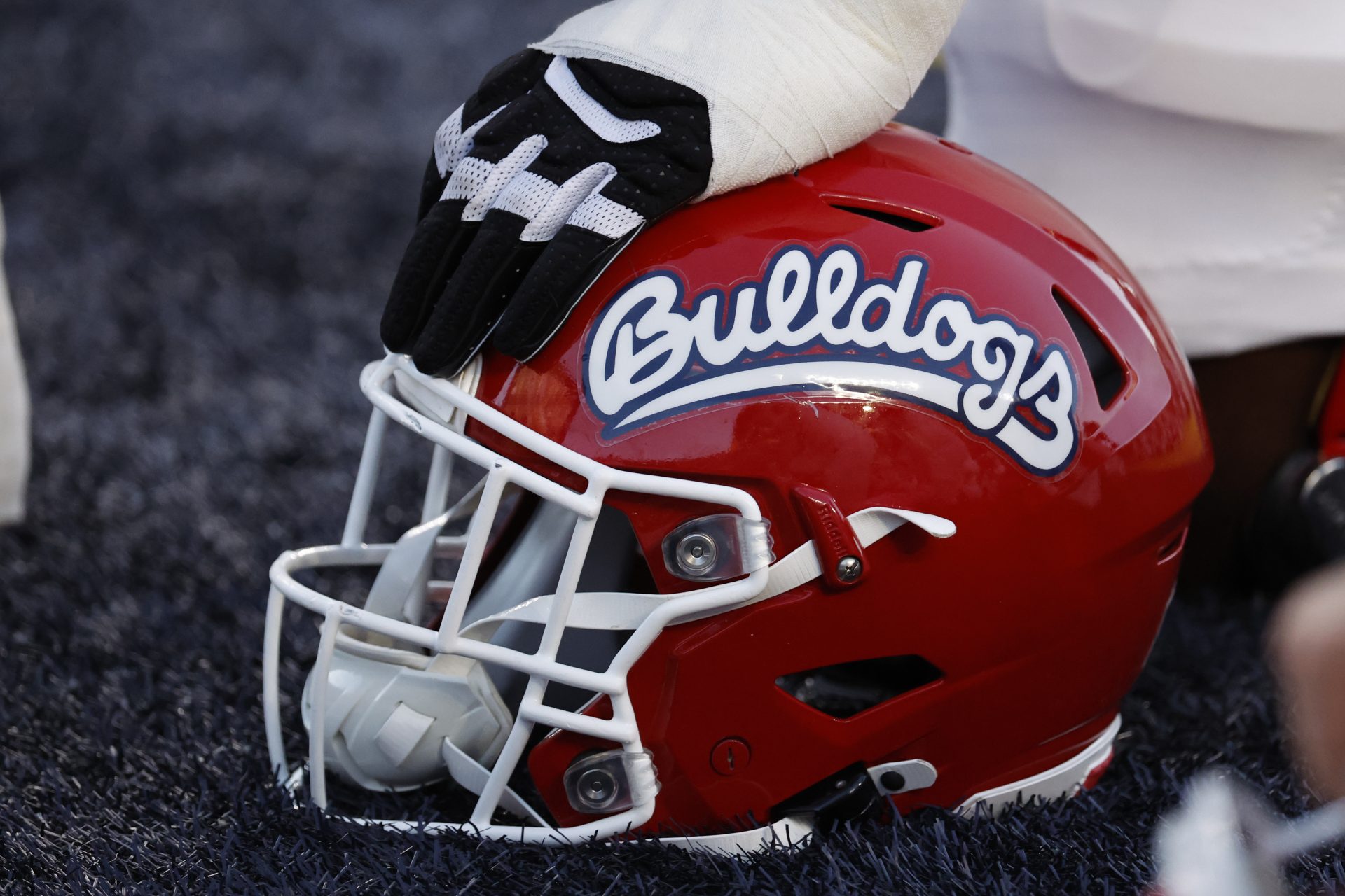 Fresno State Bulldogs offensive lineman Rolan Fullwood (71) puts his hand on his helmet before a game against the Michigan Wolverines at Michigan Stadium.