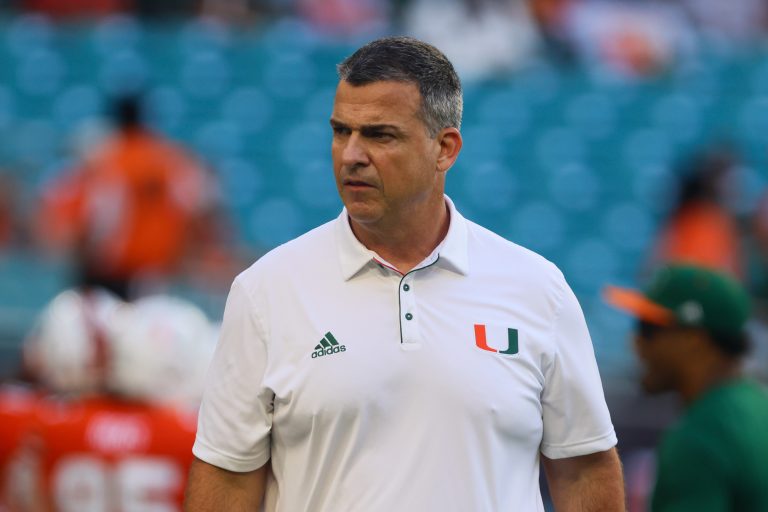 Miami Hurricanes head coach Mario Cristobal looks on before the game against the Florida A&M Rattlers at Hard Rock Stadium.