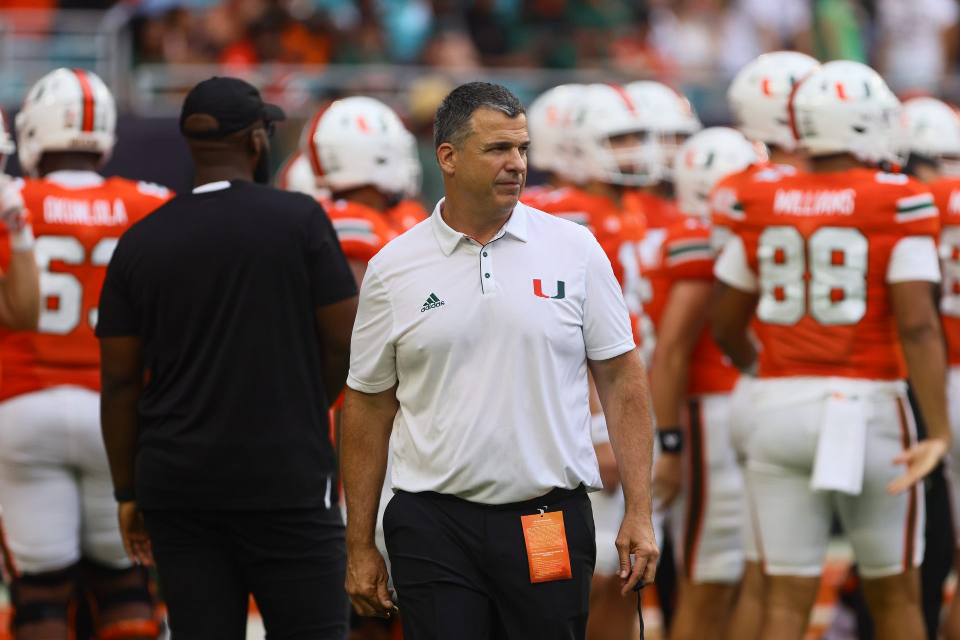 Miami Hurricanes head coach Mario Cristobal looks on from the field before the game against the Ball State Cardinals at Hard Rock Stadium.