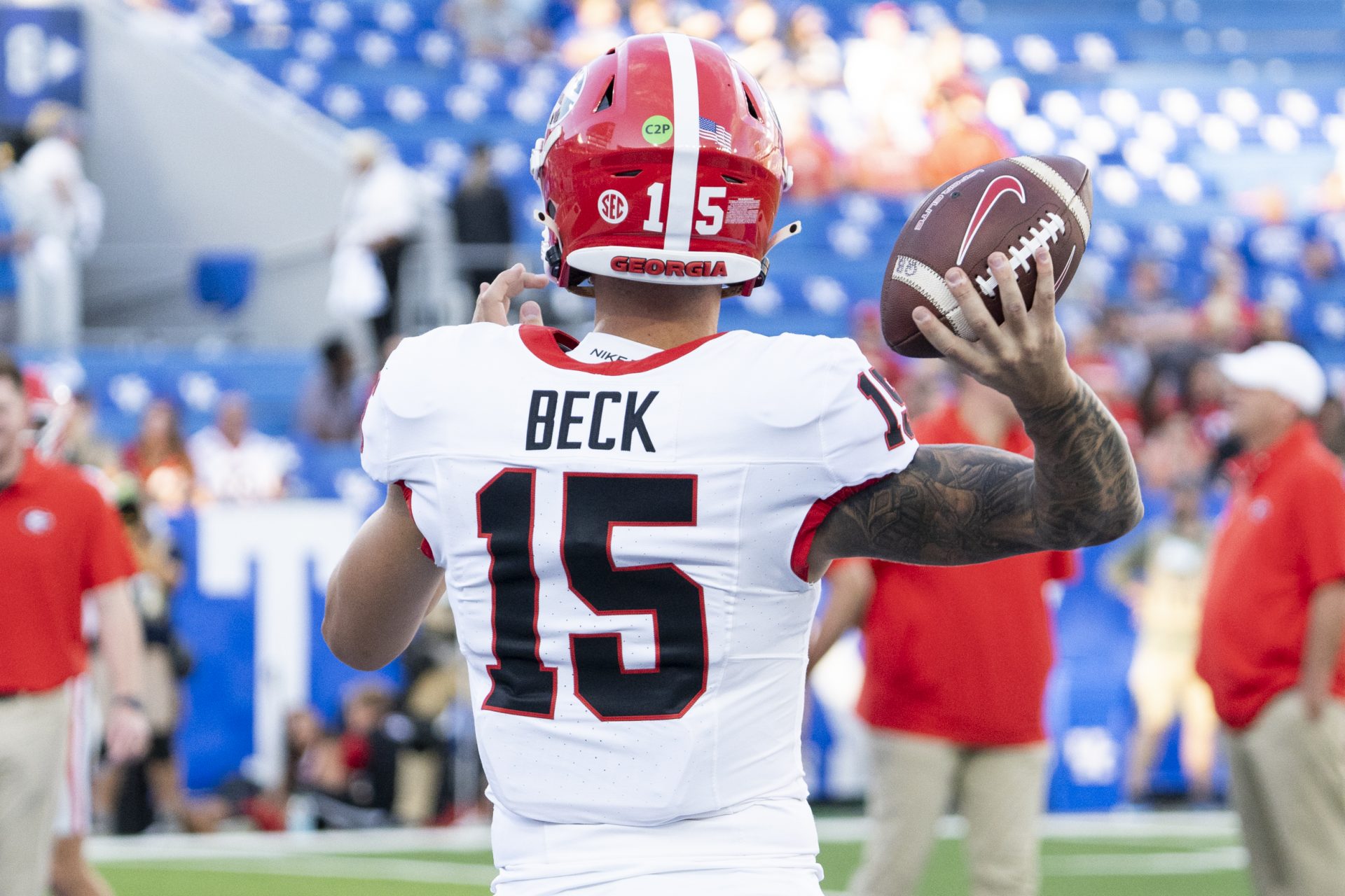 Georgia Bulldogs quarterback Carson Beck (15) warms up before the game against the Kentucky Wildcats at Kroger Field.