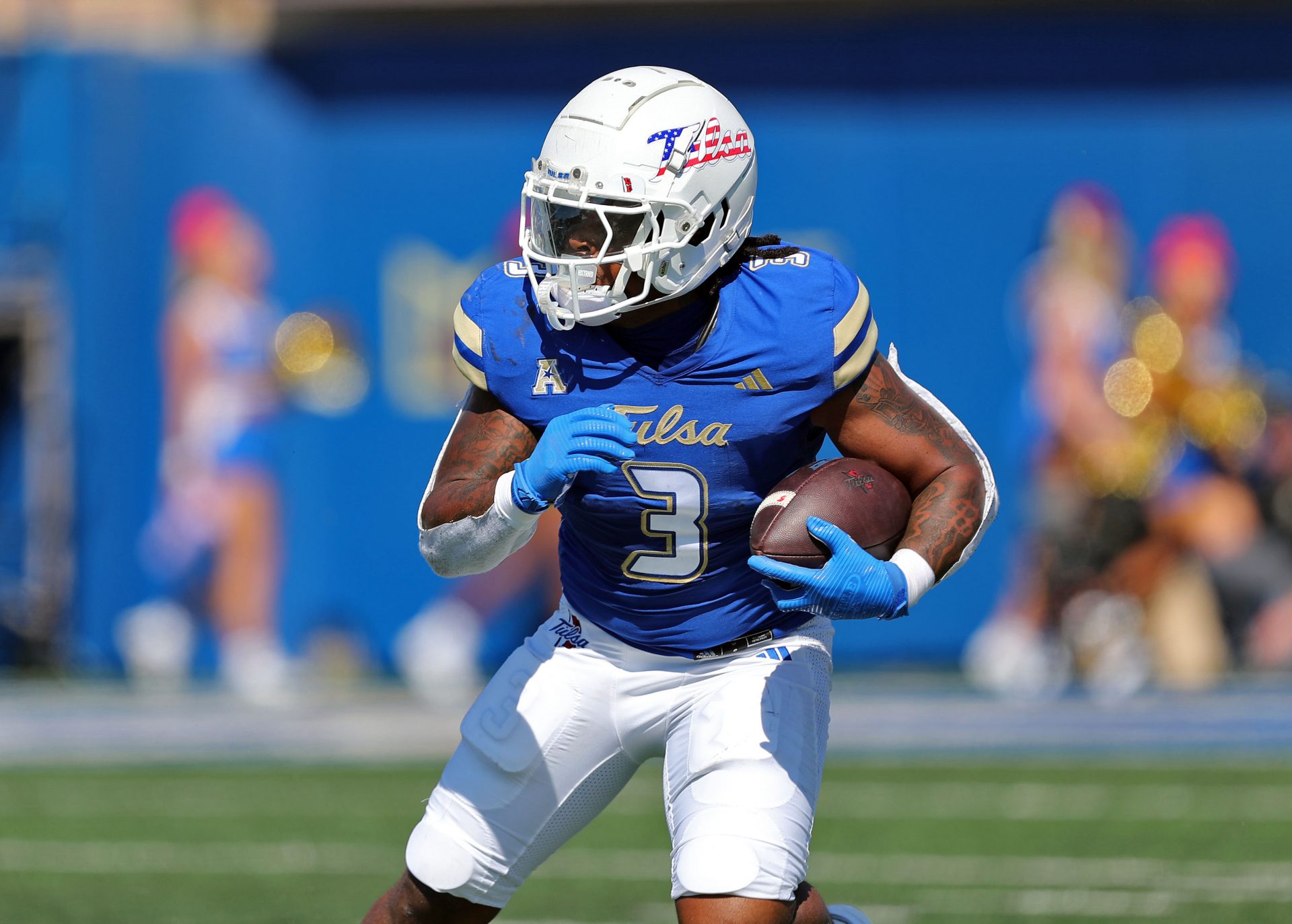 Tulsa Golden Hurricane running back Bill Jackson (3) runs after a catch against the Army Black Knights during the first half at Skelly Field at H.A. Chapman Stadium.