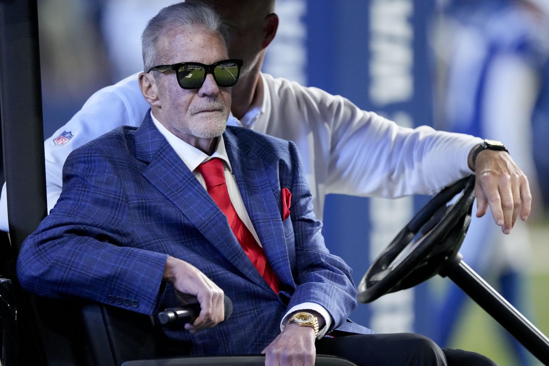 Indianapolis Colts owner Jim Irsay sits in a golf cart during a Ring of Honor ceremony for Dallas Clark during a game against the Miami Dolphins at Lucas Oil Stadium.