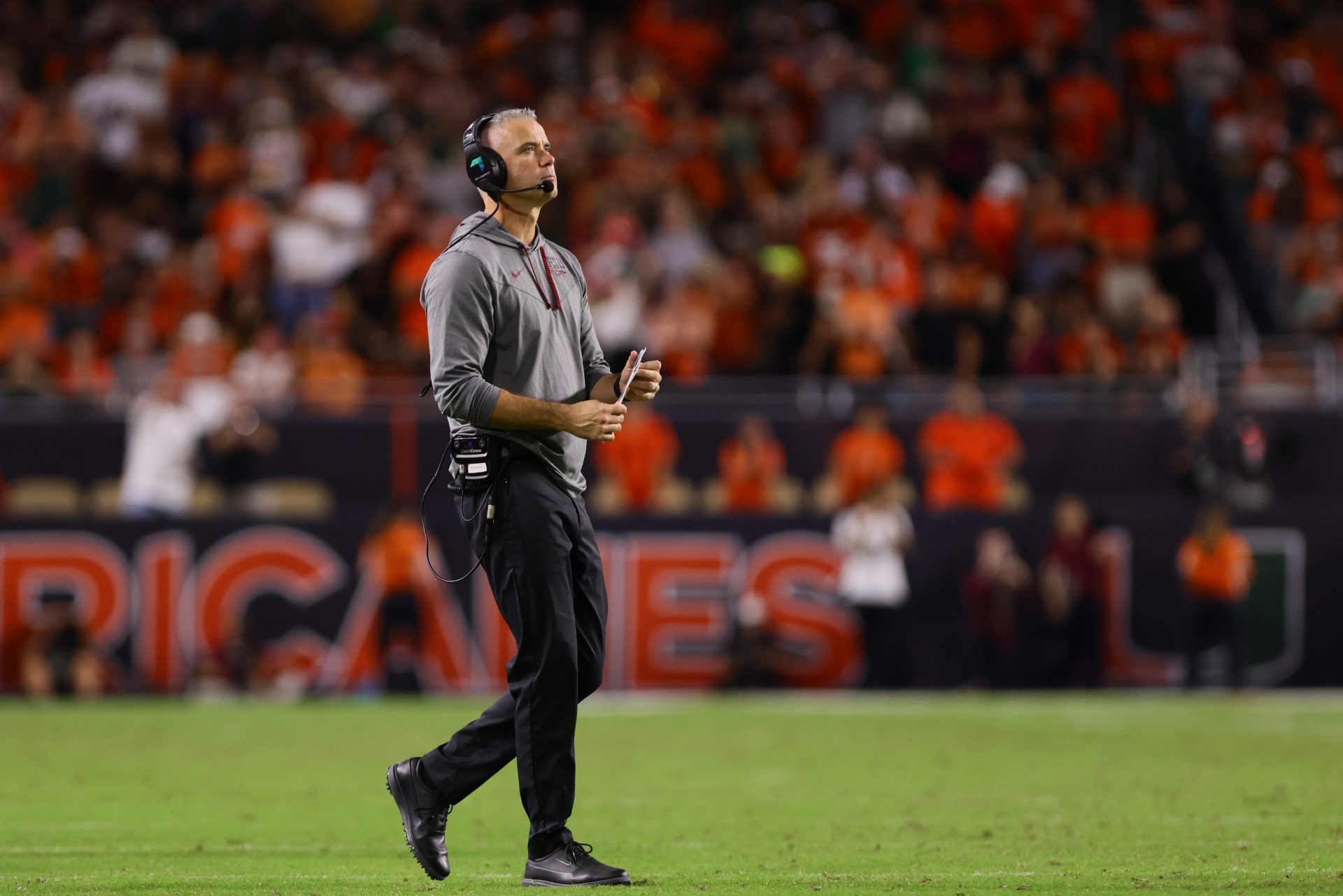 Florida State Seminoles head coach Mike Norvell looks on from field against the Miami Hurricanes during the fourth quarter at Hard Rock Stadium.