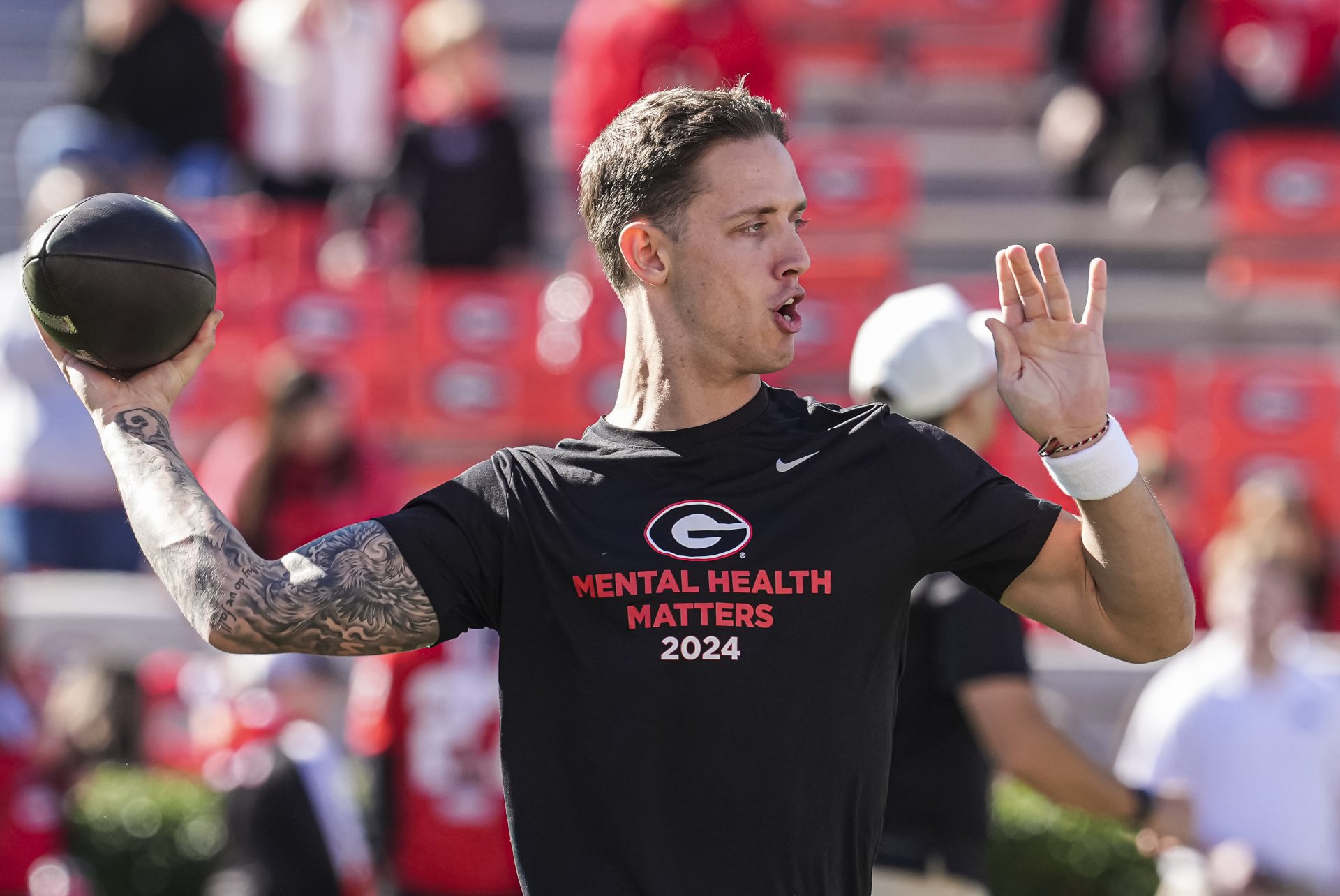 Georgia Bulldogs quarterback Carson Beck (15) shown on the field prior to the game against the Massachusetts Minutemen at Sanford Stadium.
