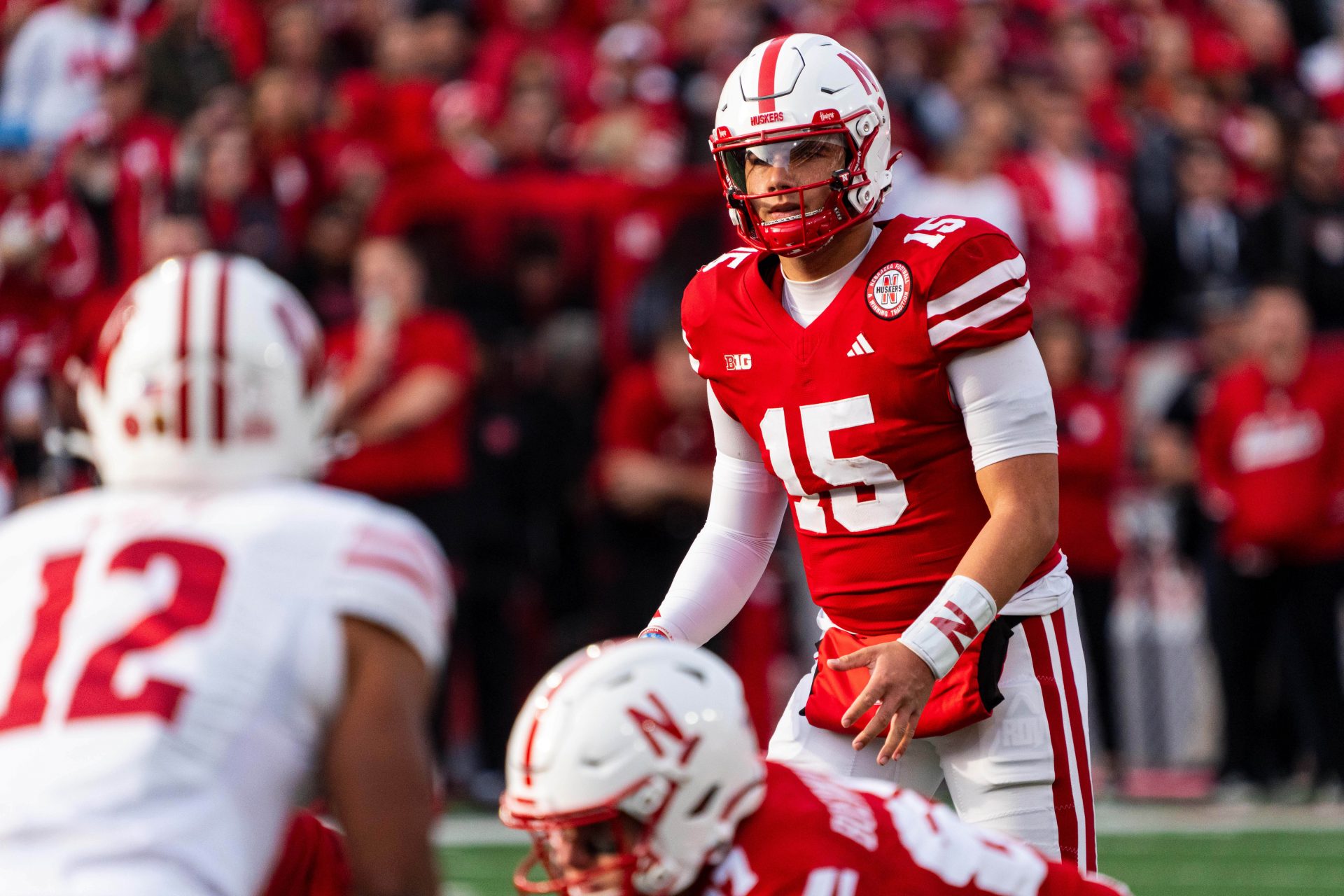 Nebraska Cornhuskers quarterback Dylan Raiola (15) waits for a snap against the Wisconsin Badgers during the first quarter at Memorial Stadium.