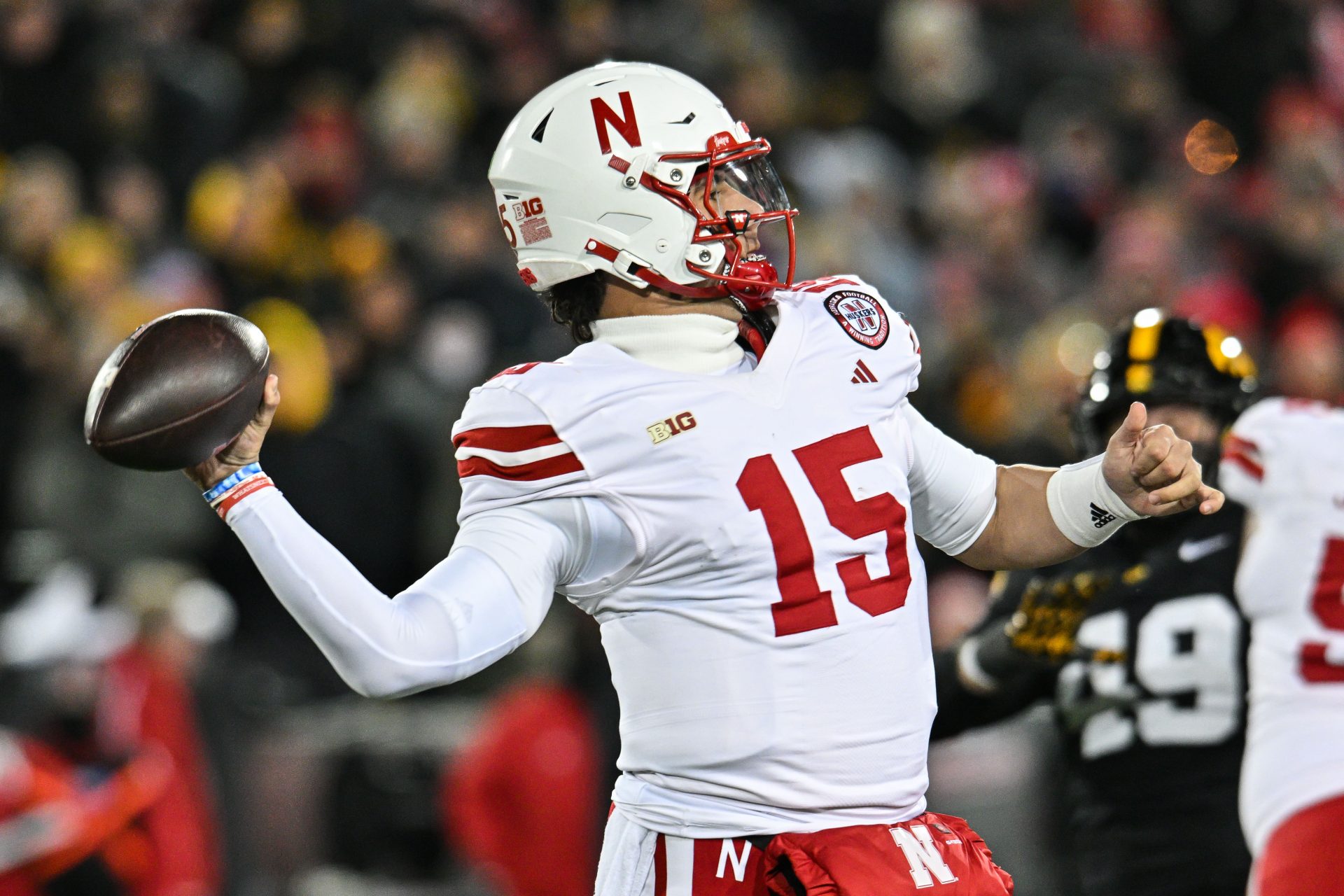 Nebraska Cornhuskers quarterback Dylan Raiola (15) throws a pass against the Iowa Hawkeyes during the first quarter at Kinnick Stadium.