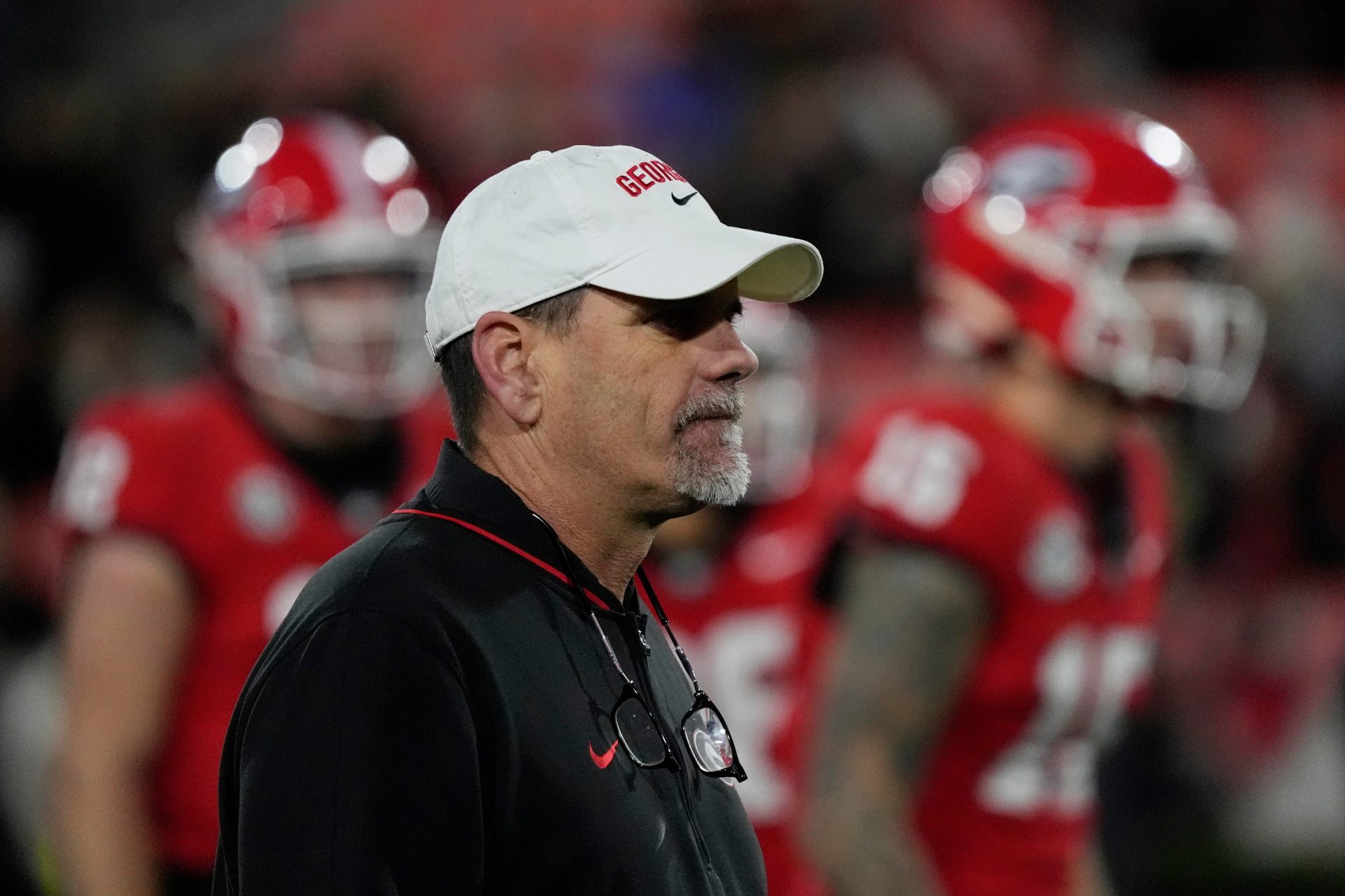 Georgia Offensive Coordinator Mike Bobo looks on during warm ups before the start of a NCAA college football game against Georgia Tech in Athens, Ga., on Friday, Nov. 29, 2024.