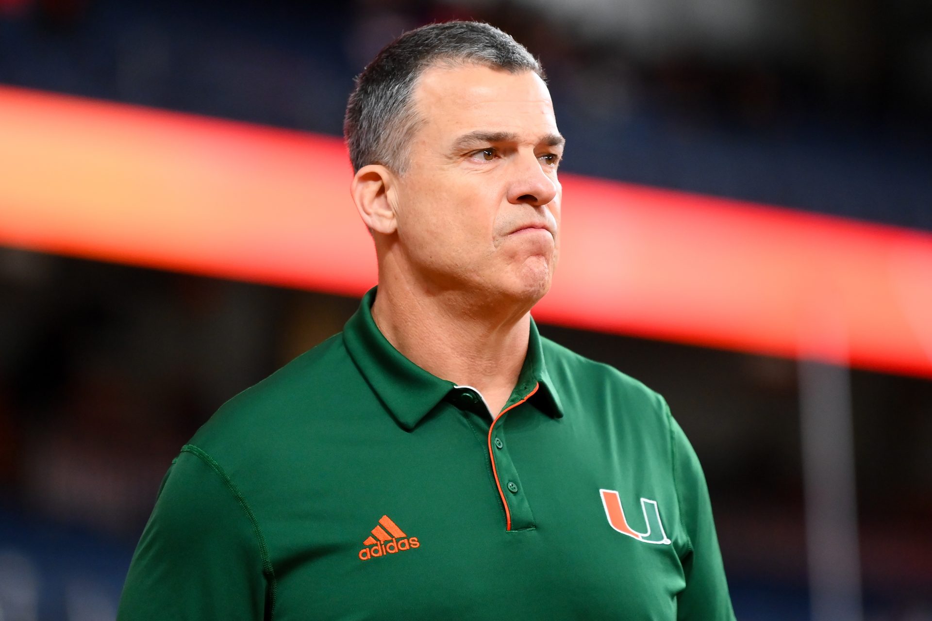 Miami Hurricanes head coach Mario Cristobal looks on prior to the game against the Syracuse Orange at the JMA Wireless Dome.